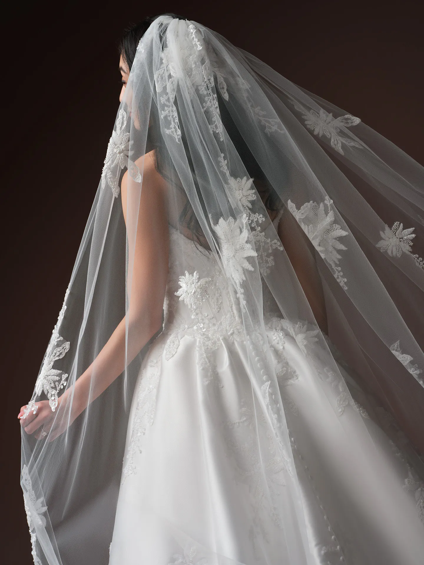 Sottero and Midgley Lucinde, back view beaded lace ballgown with floral veil.
