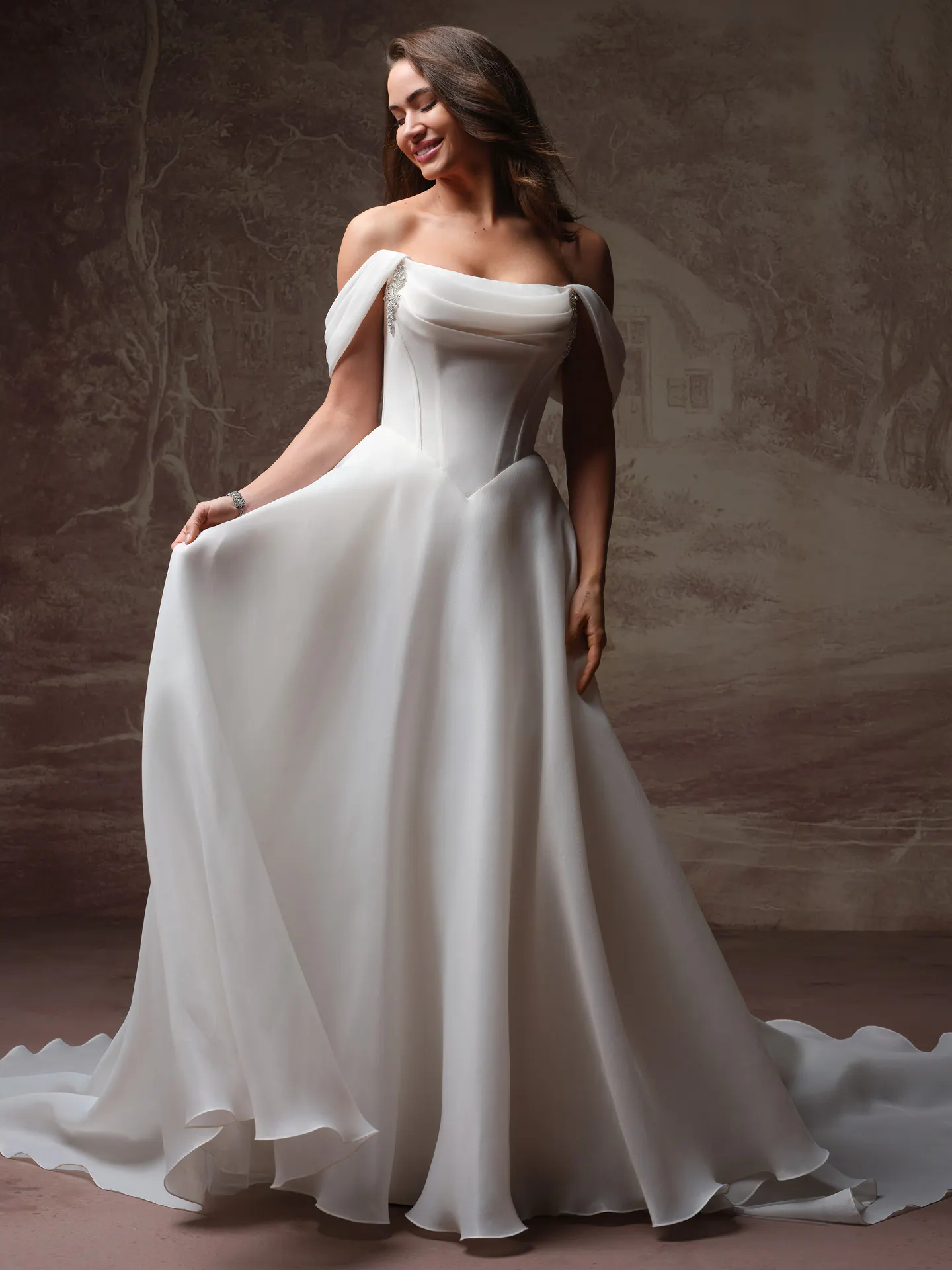 Maggie Sottero Abilene front view, off-shoulder organza A-line bridal gown.
