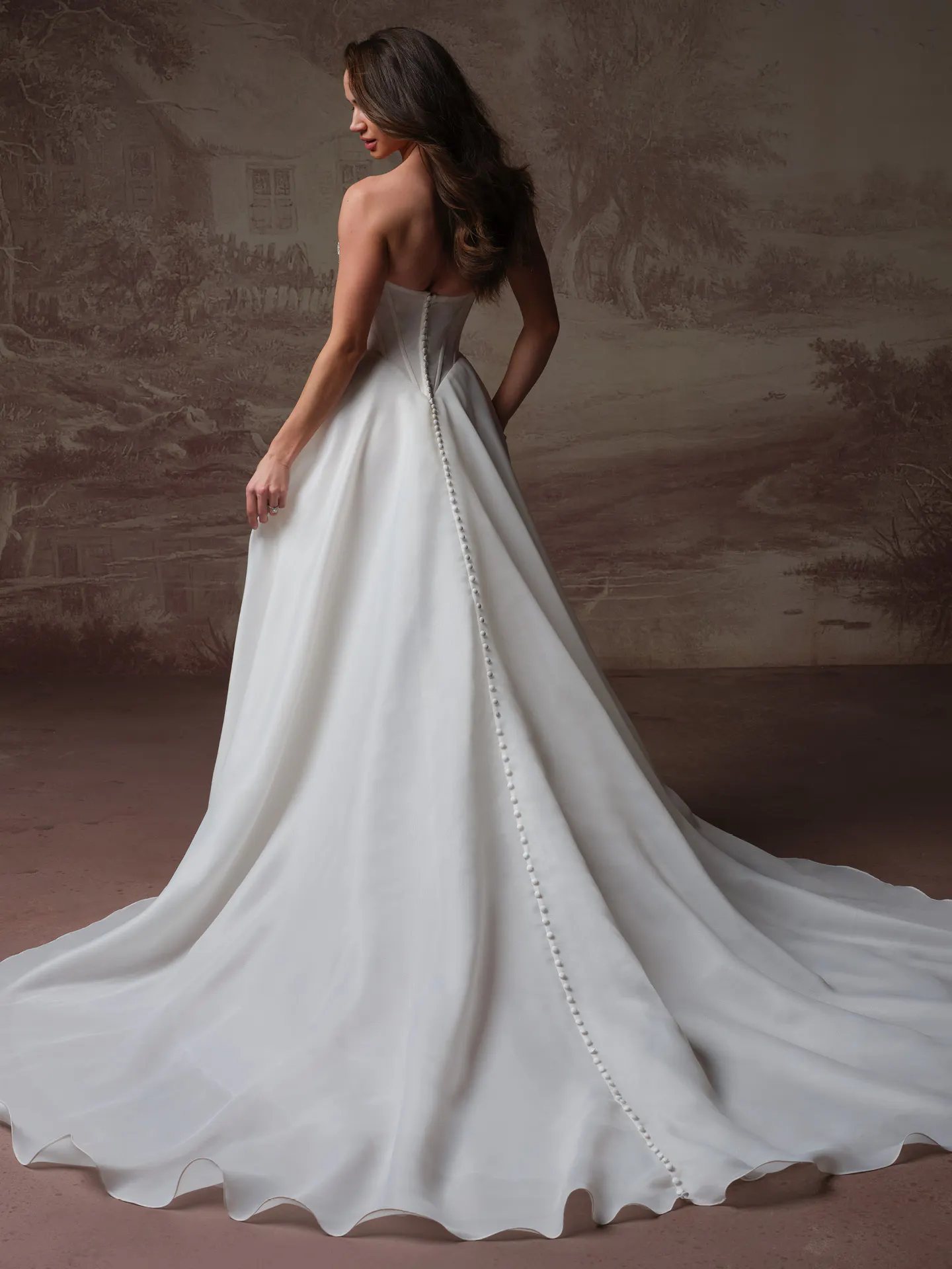 Maggie Sottero Abilene A Line dress back view with button detail.