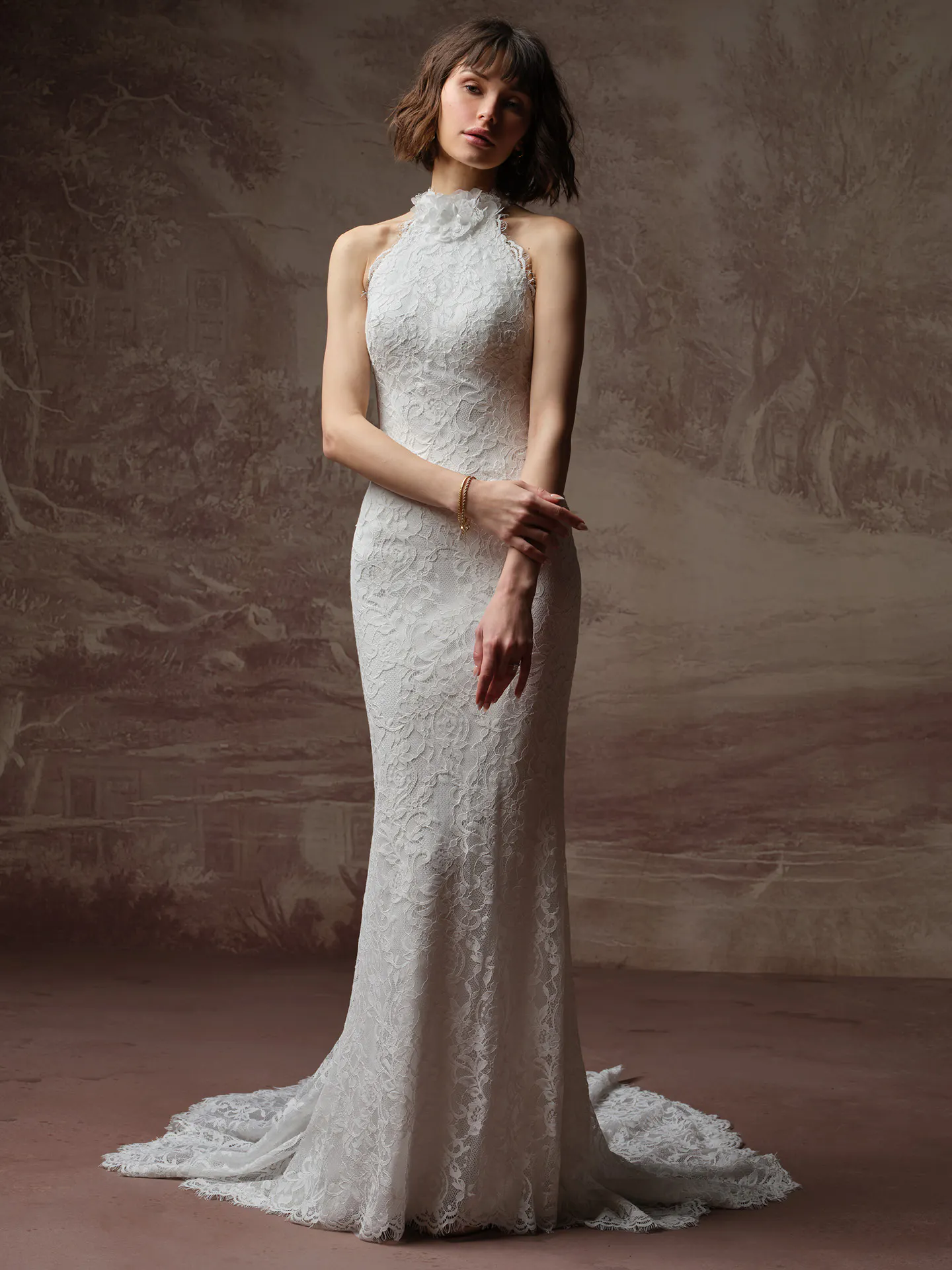 Maggie Sottero Anya front view lace high neck sheath wedding dress.