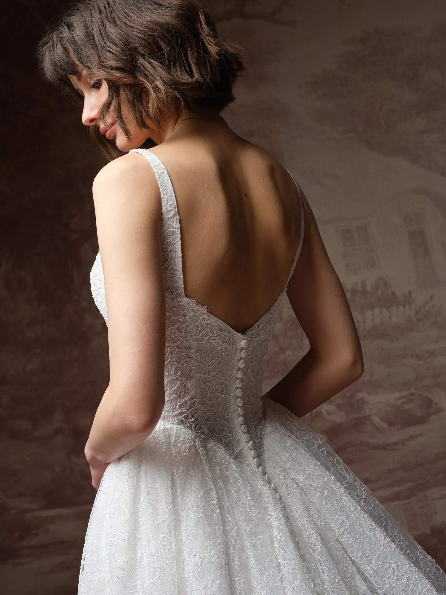 Maggie Sottero Autumn back view lace A-Line dress.