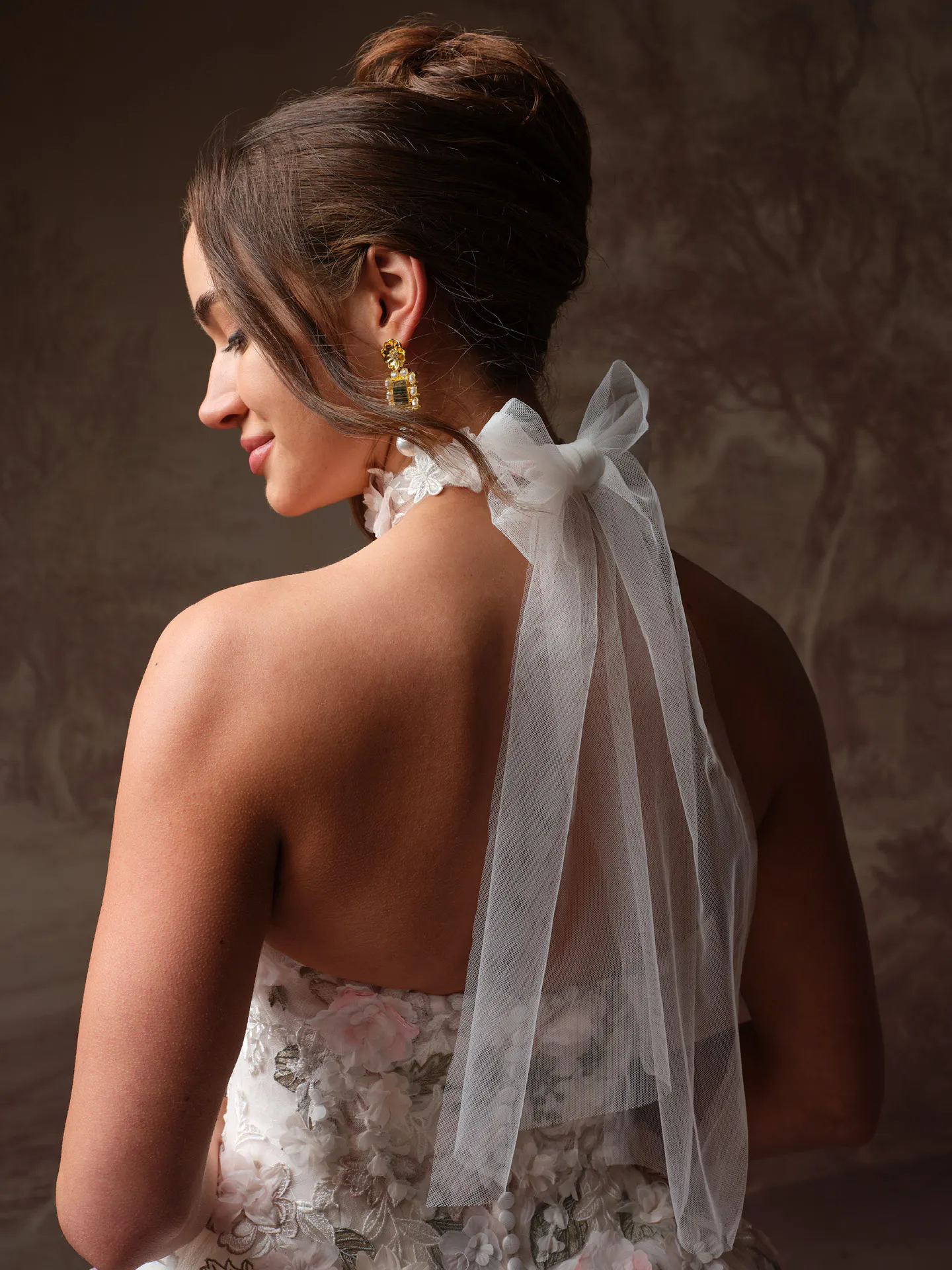Benton floral Chantilly lace A-line wedding dress back view.