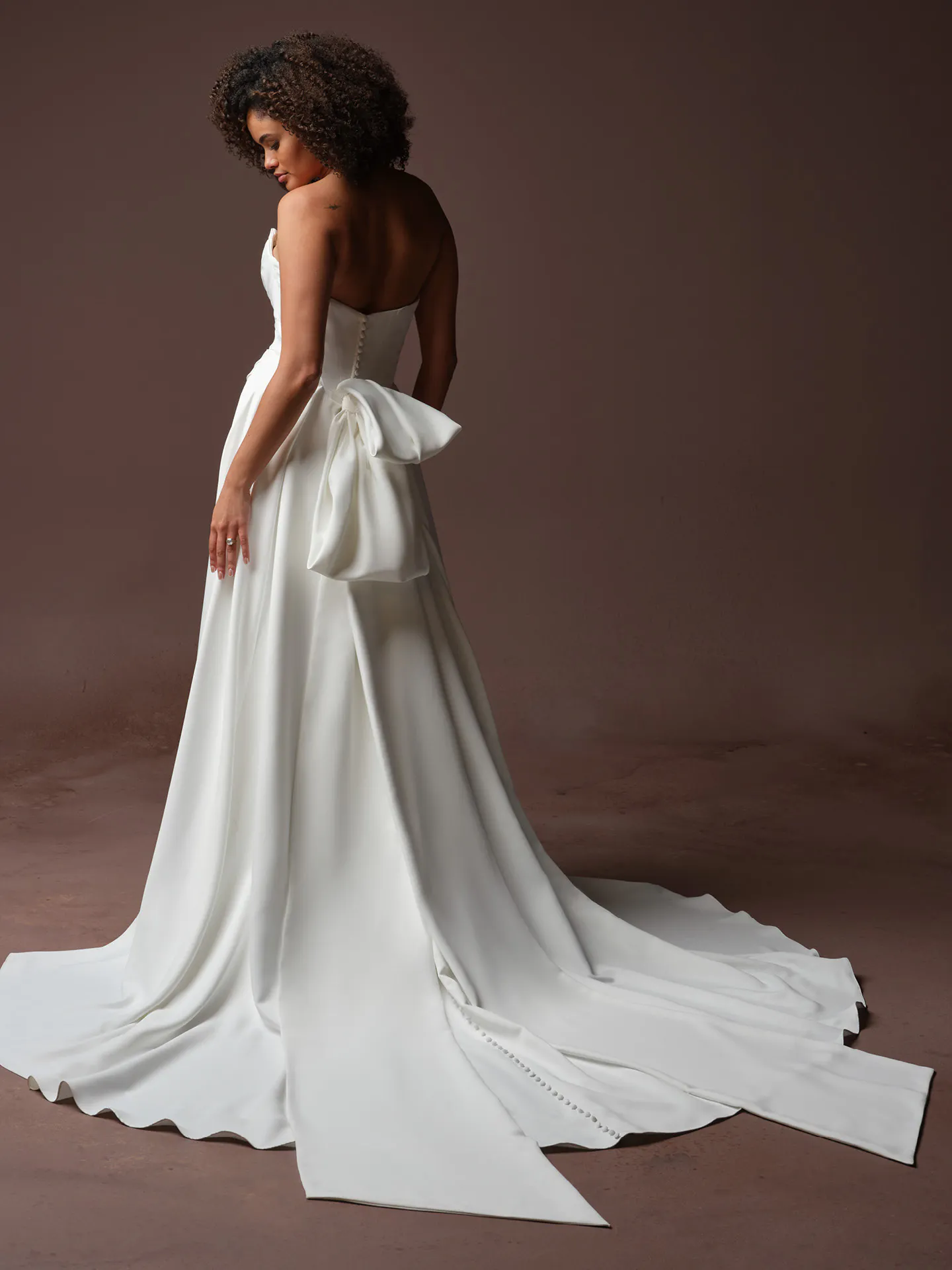 Maggie Sottero Calliope detachable bow, front view.