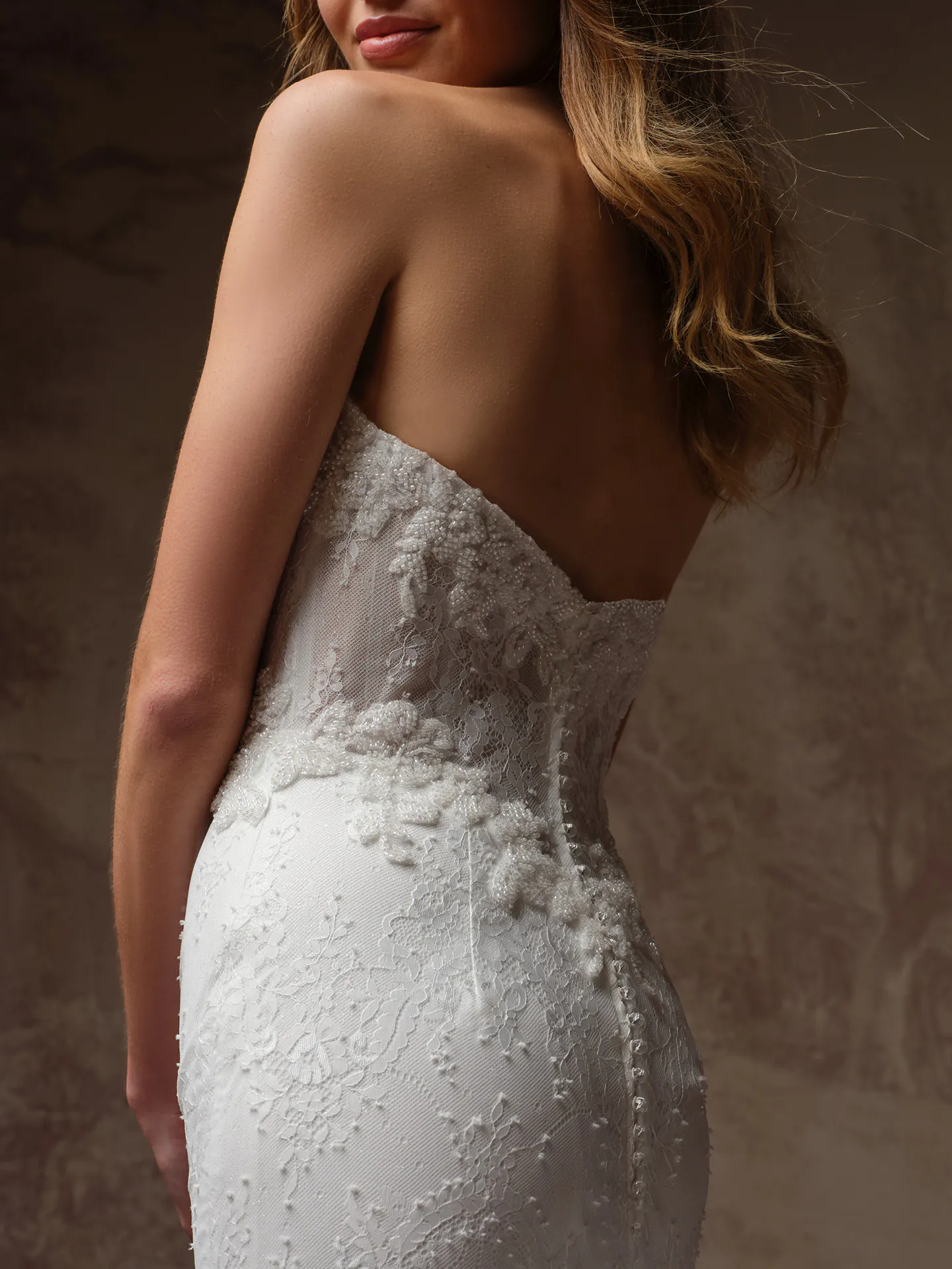 Maggie Sottero Collette back view beaded Chantilly lace wedding dress.