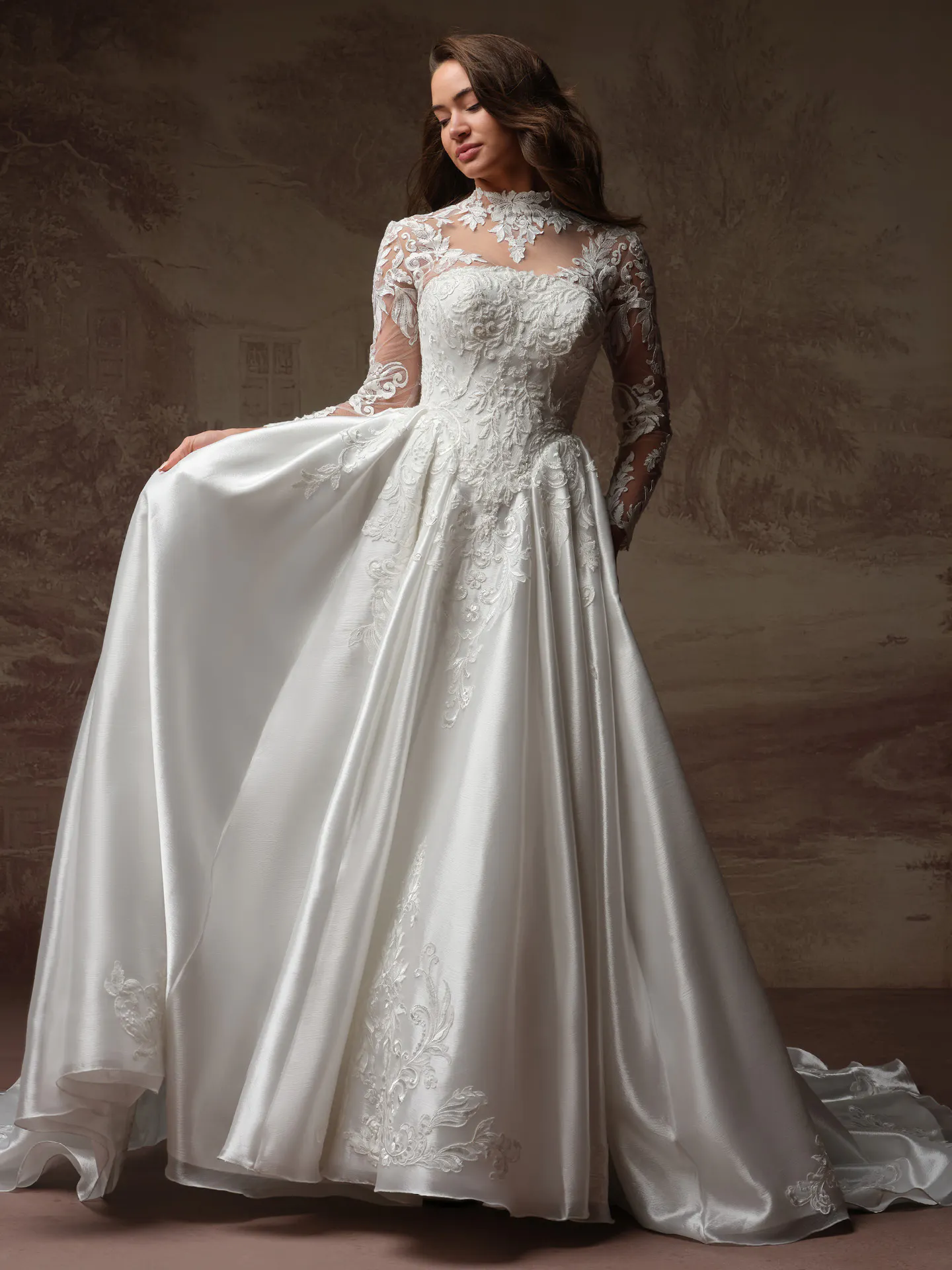 Dahlia modest wedding dress with long satin skirt front view.