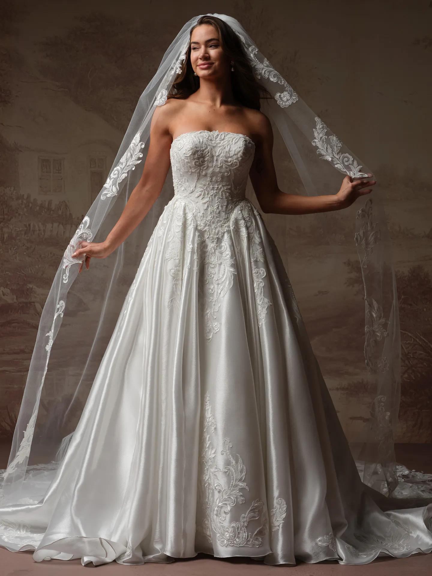 Maggie Sottero Dahlia front view strapless lace organza wedding dress and veil.