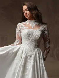 Classic unembellished illusion lace long sleeve bridal jacket