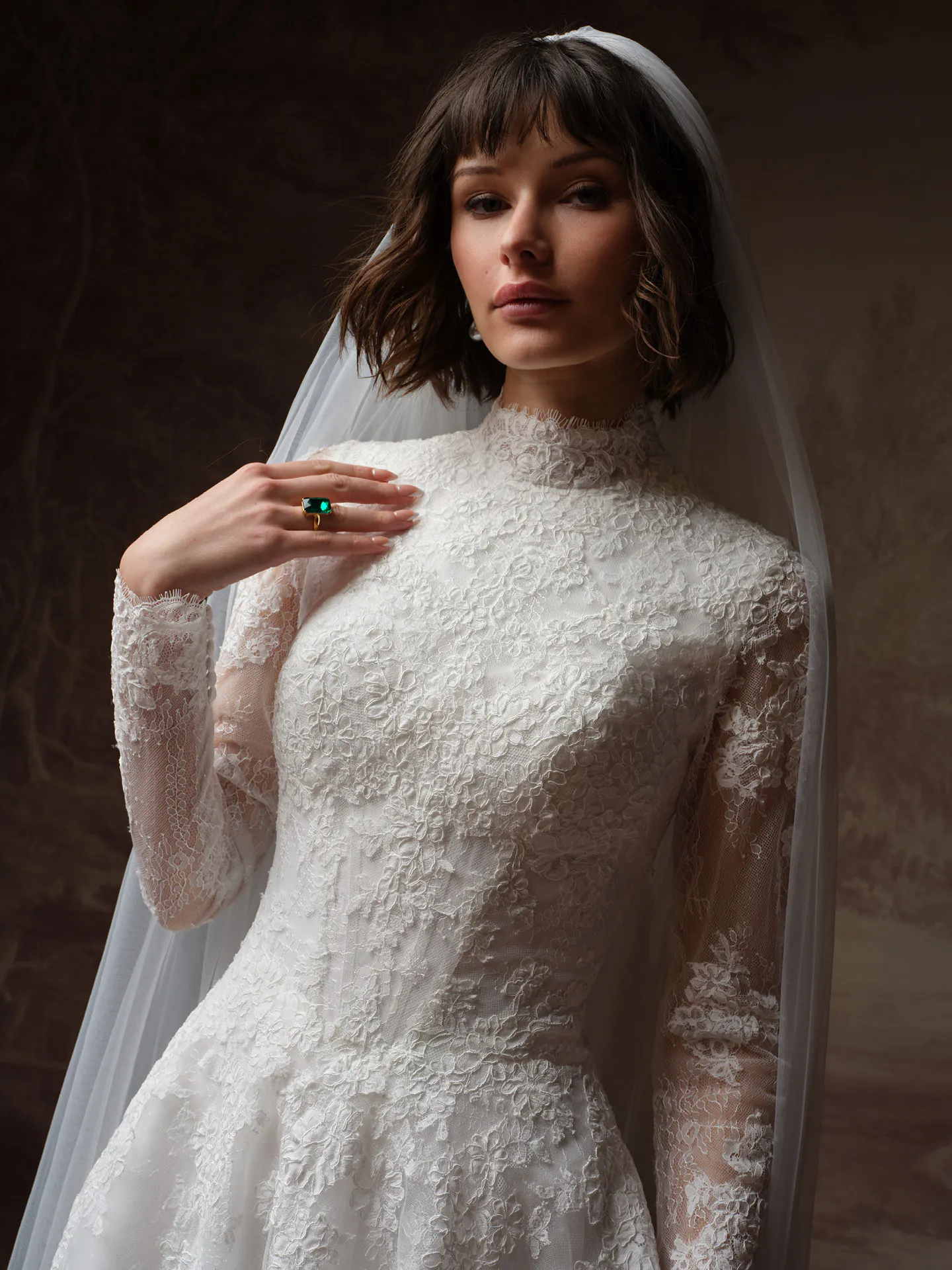 Maggie Sottero Dominique front view lace high neck wedding dress.
