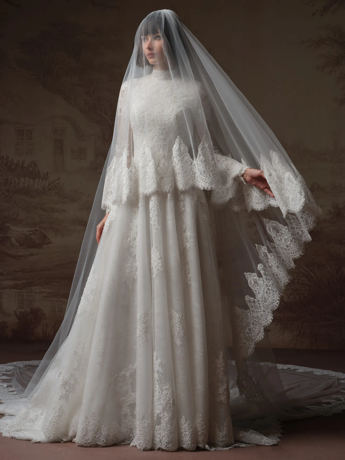 Dominique modest high neck lace wedding dress front view with veil.