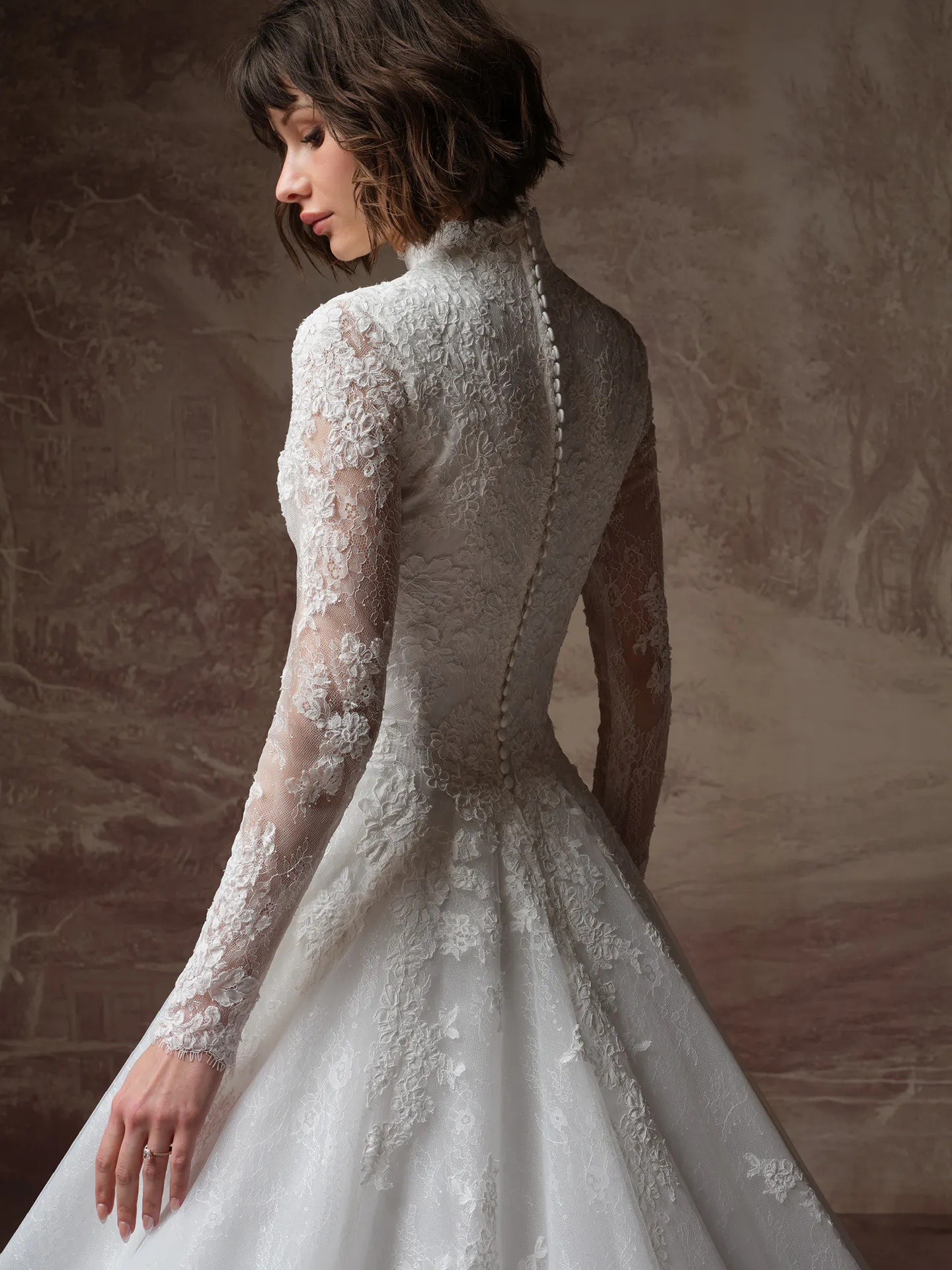 Maggie Sottero Dominique back view lace wedding dress.