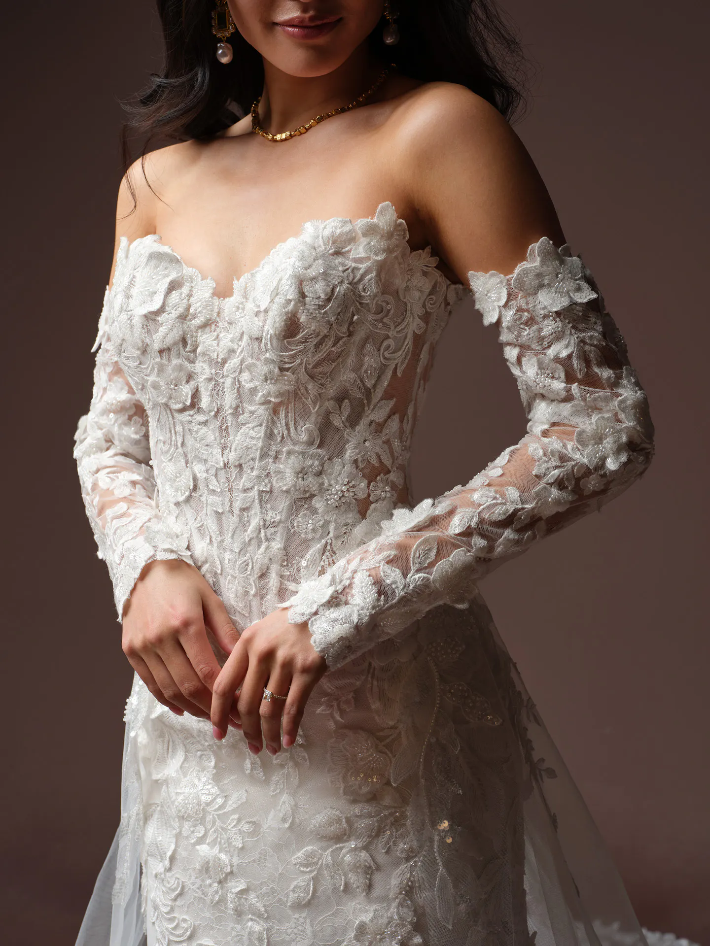 Maggie Sottero Estelle front view lace wedding dress with 3 D floral details.