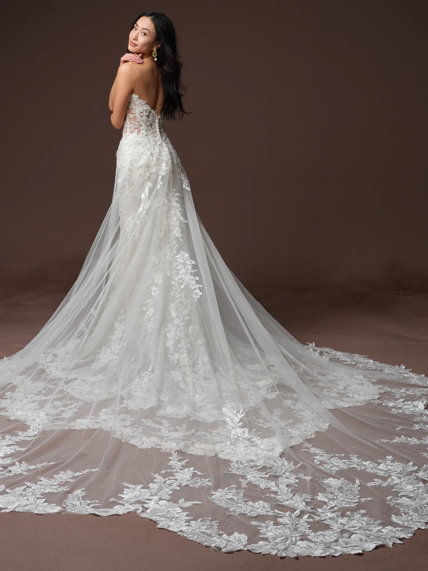 Maggie Sottero Estelle back view, beaded lace with long train.