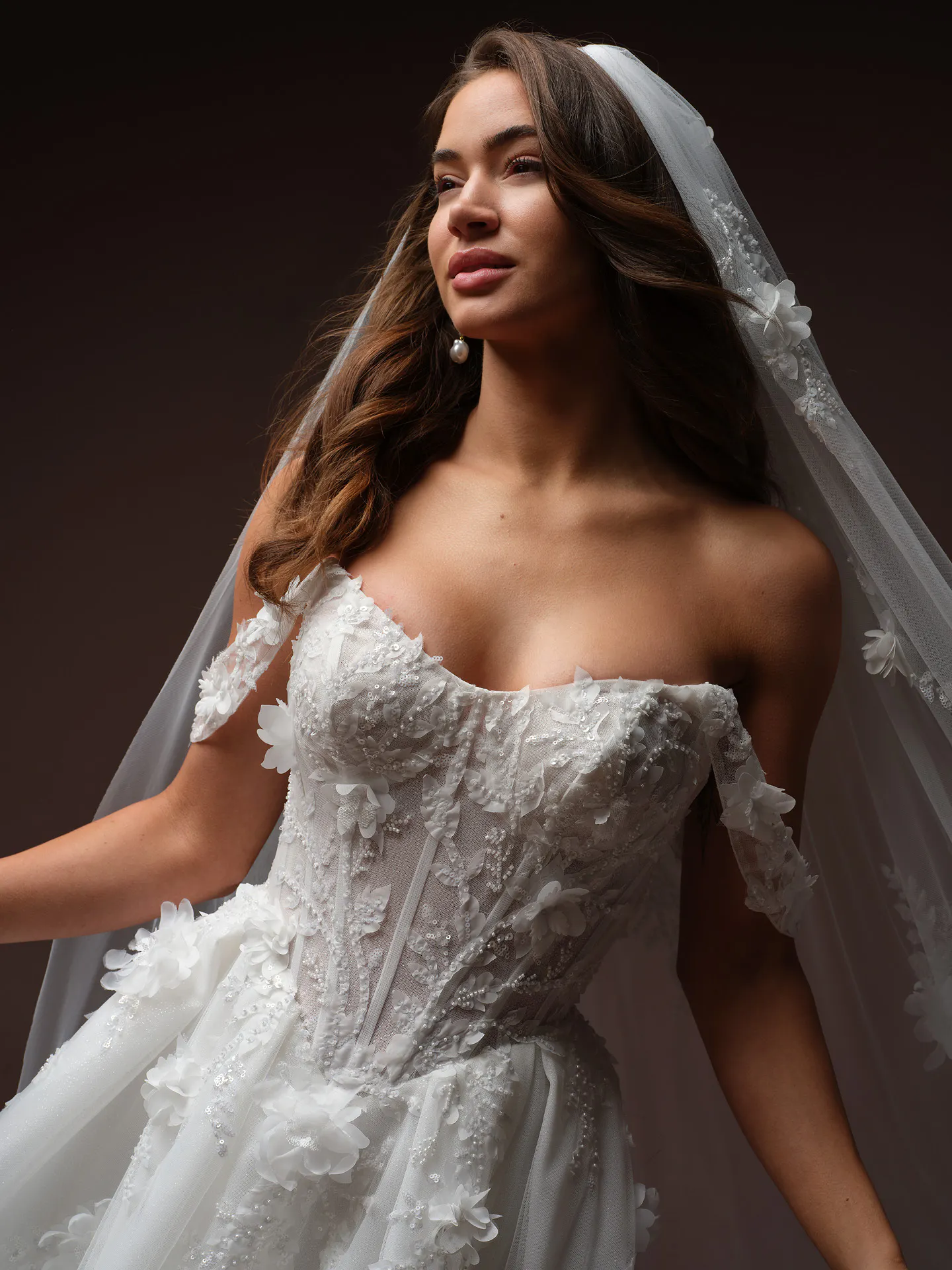 Maggie Sottero Fern front view 3 D floral lace wedding dress with veil.