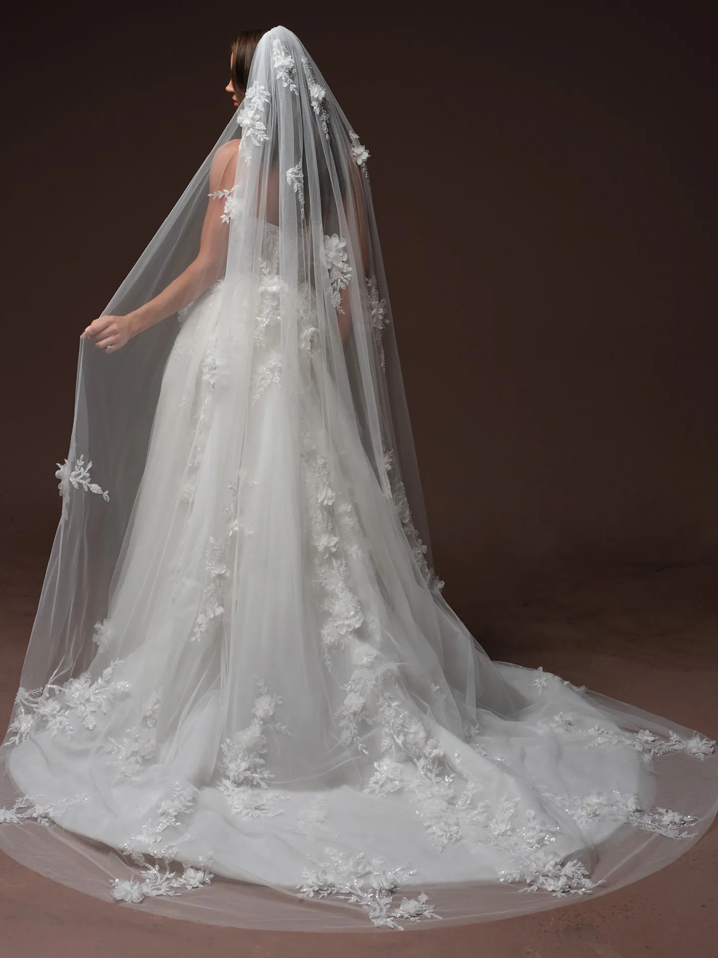 Maggie Sottero Fern back view, 3 D floral lace veil and dress.