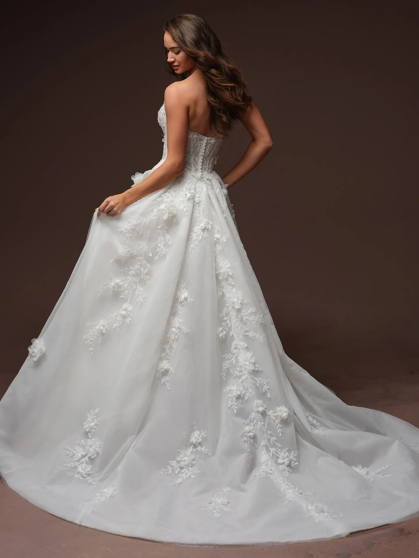 Maggie Sottero Fern back view floral lace dress.