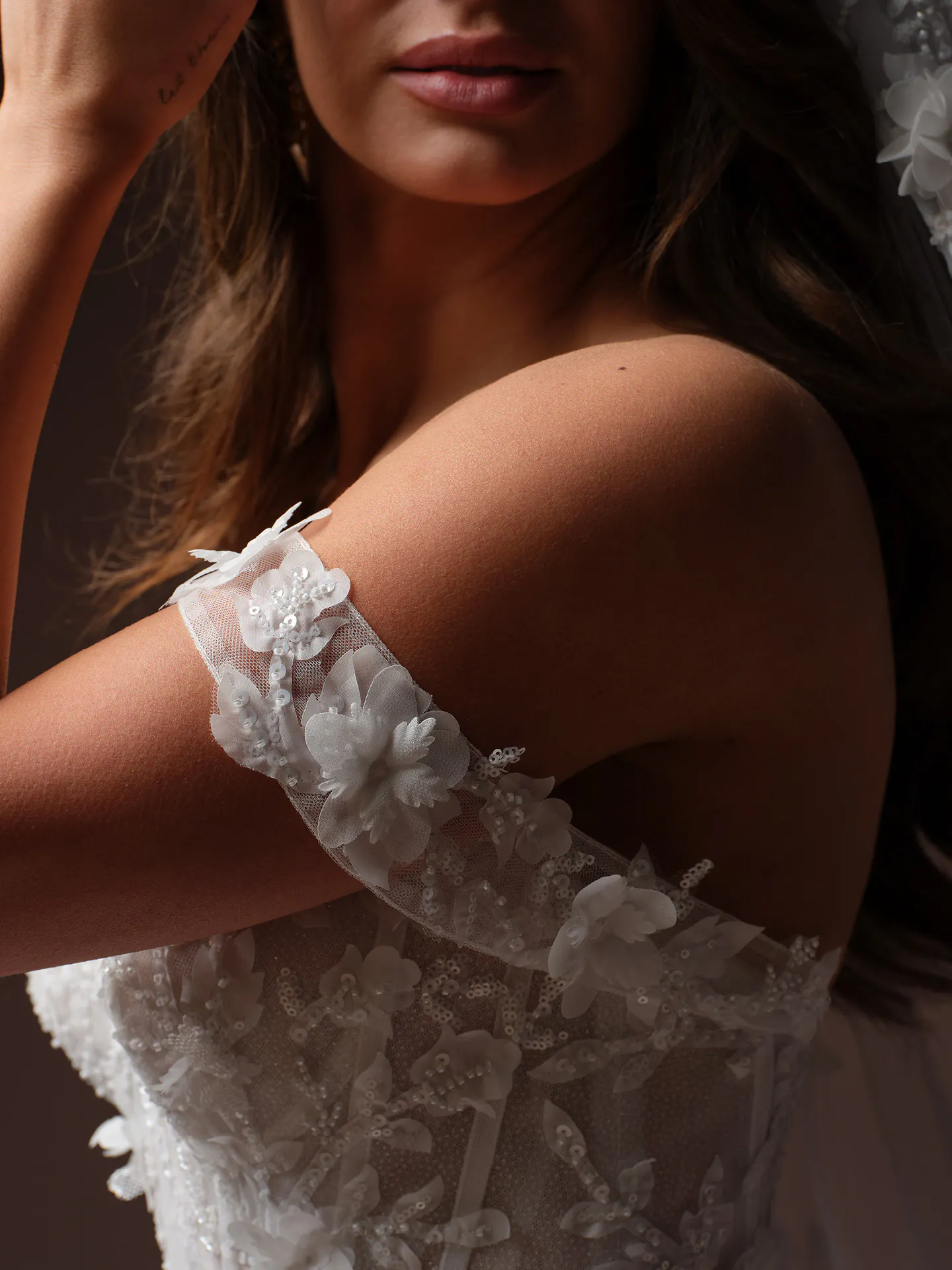 Maggie Sottero Fern detachable cap sleeves, front view.