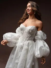 Ethereal off-the-shoulder beaded balloon bridal sleeves