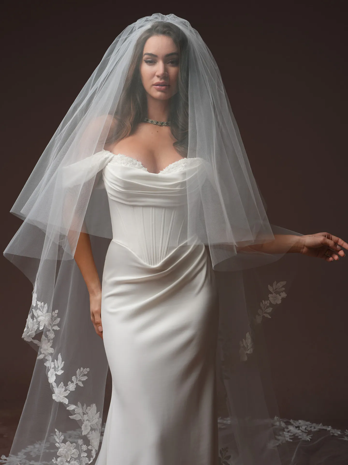 Maggie Sottero Justina front view sleeveless with veil.