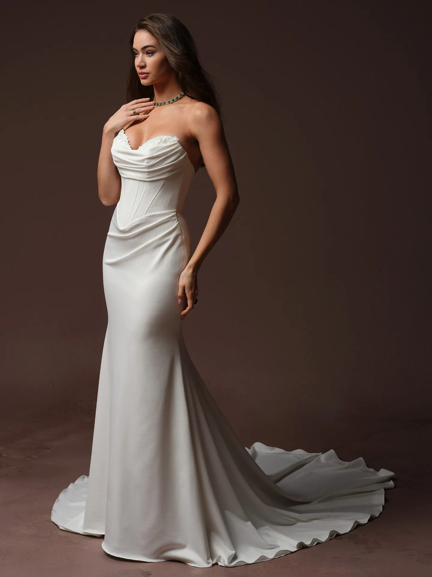 Maggie Sottero Justina side view, beaded bodice, elegant train.