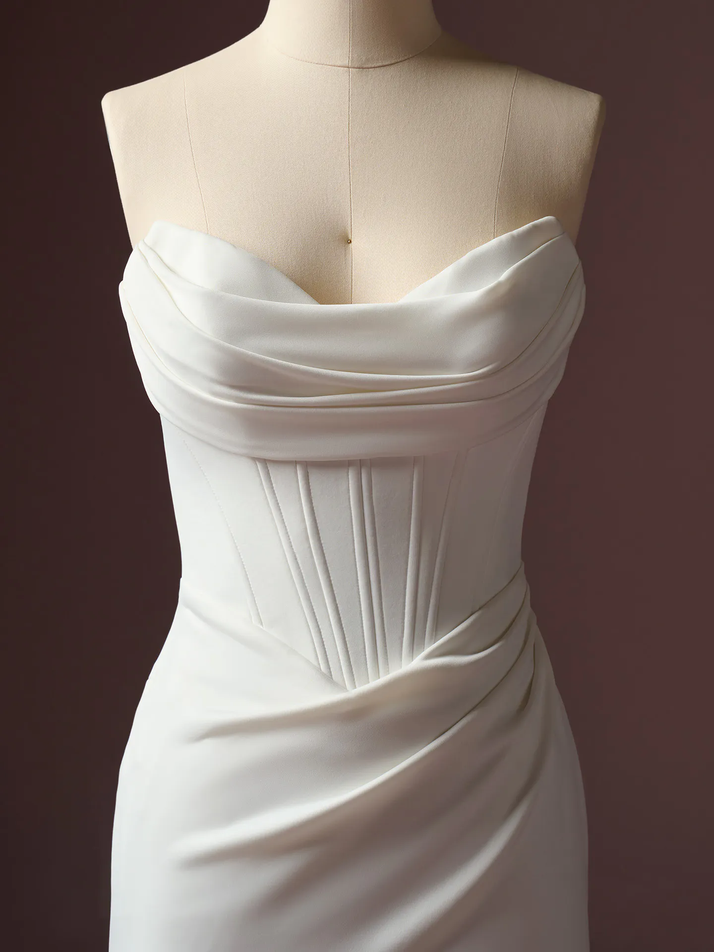 Maggie Sottero Justina front view elegant bodice on mannequin.