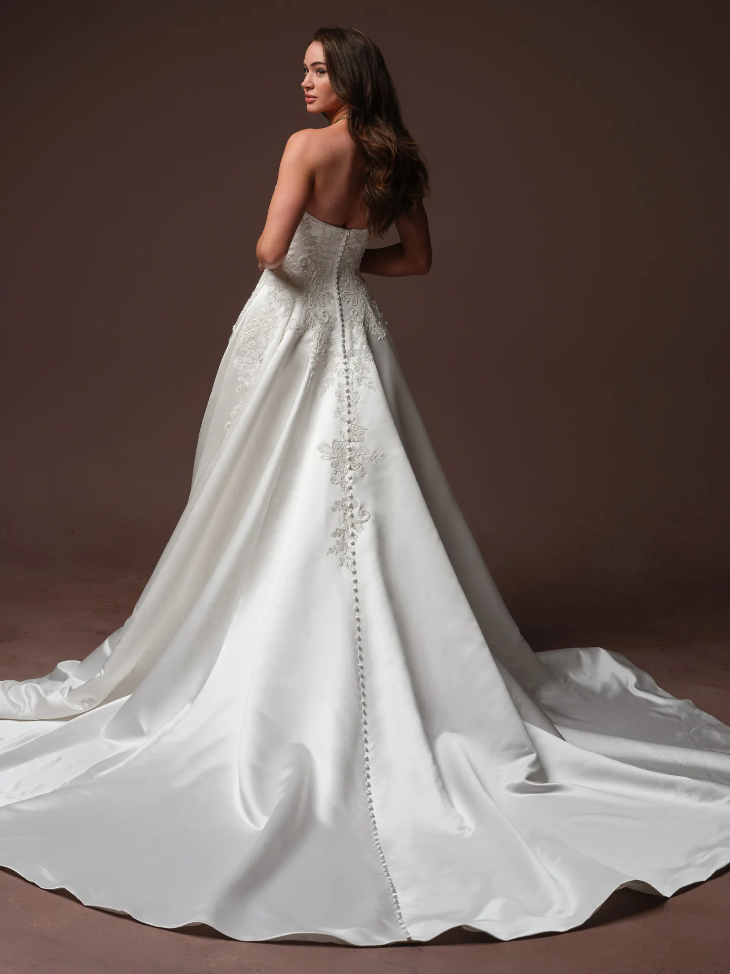 Maggie Sottero Landis back view ballgown wedding dress with lace and satin train.