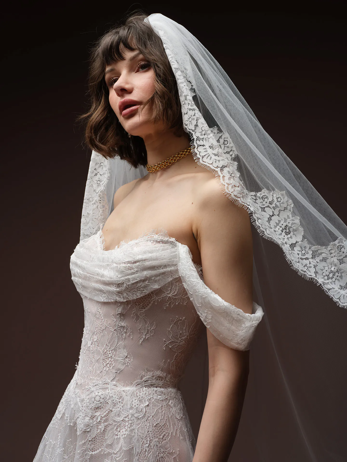 Maelle Chantilly Lace A Line side view with veil Maggie Sottero.