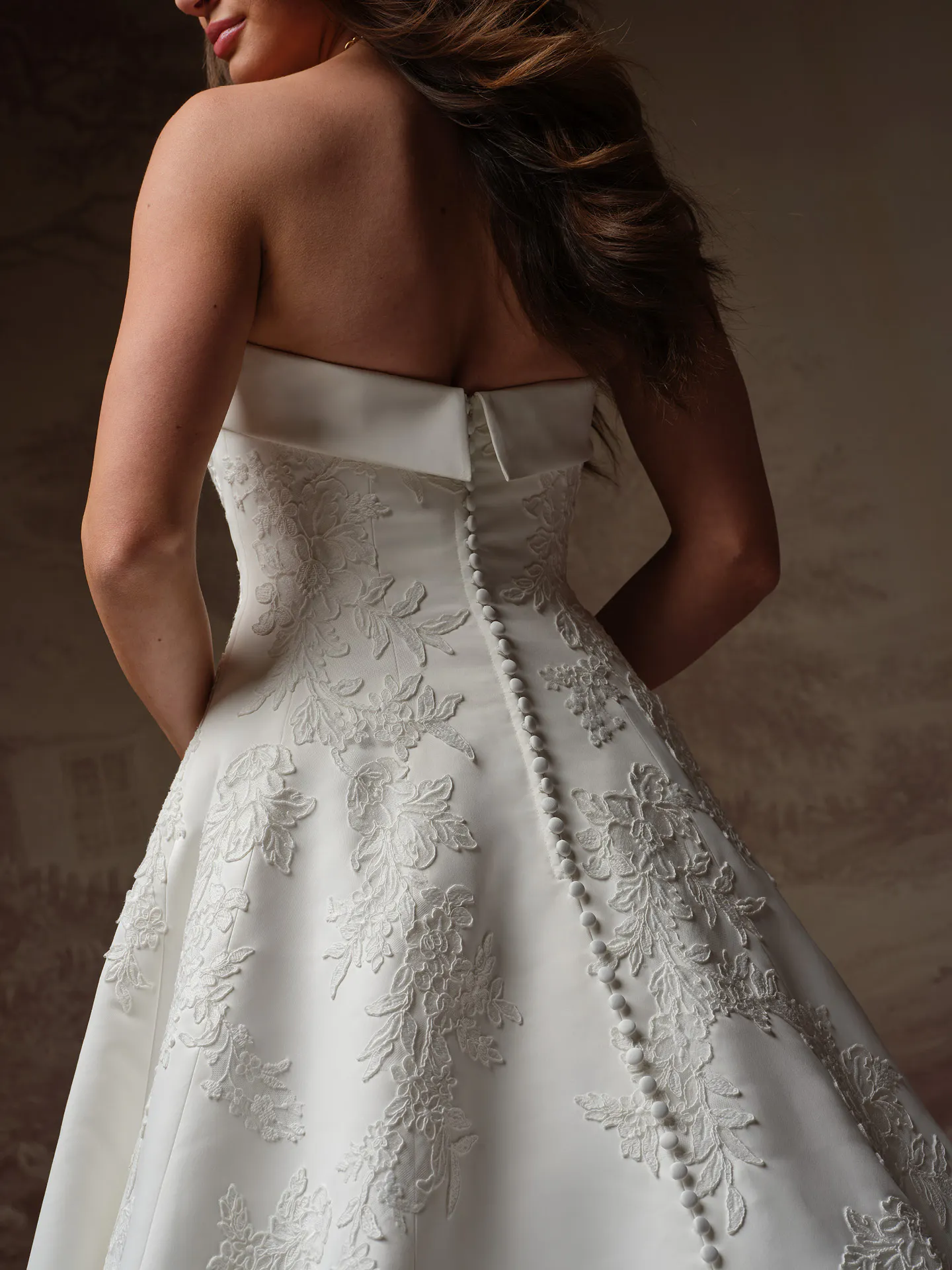 Maggie Sottero Mileva back view lace A-line wedding dress.