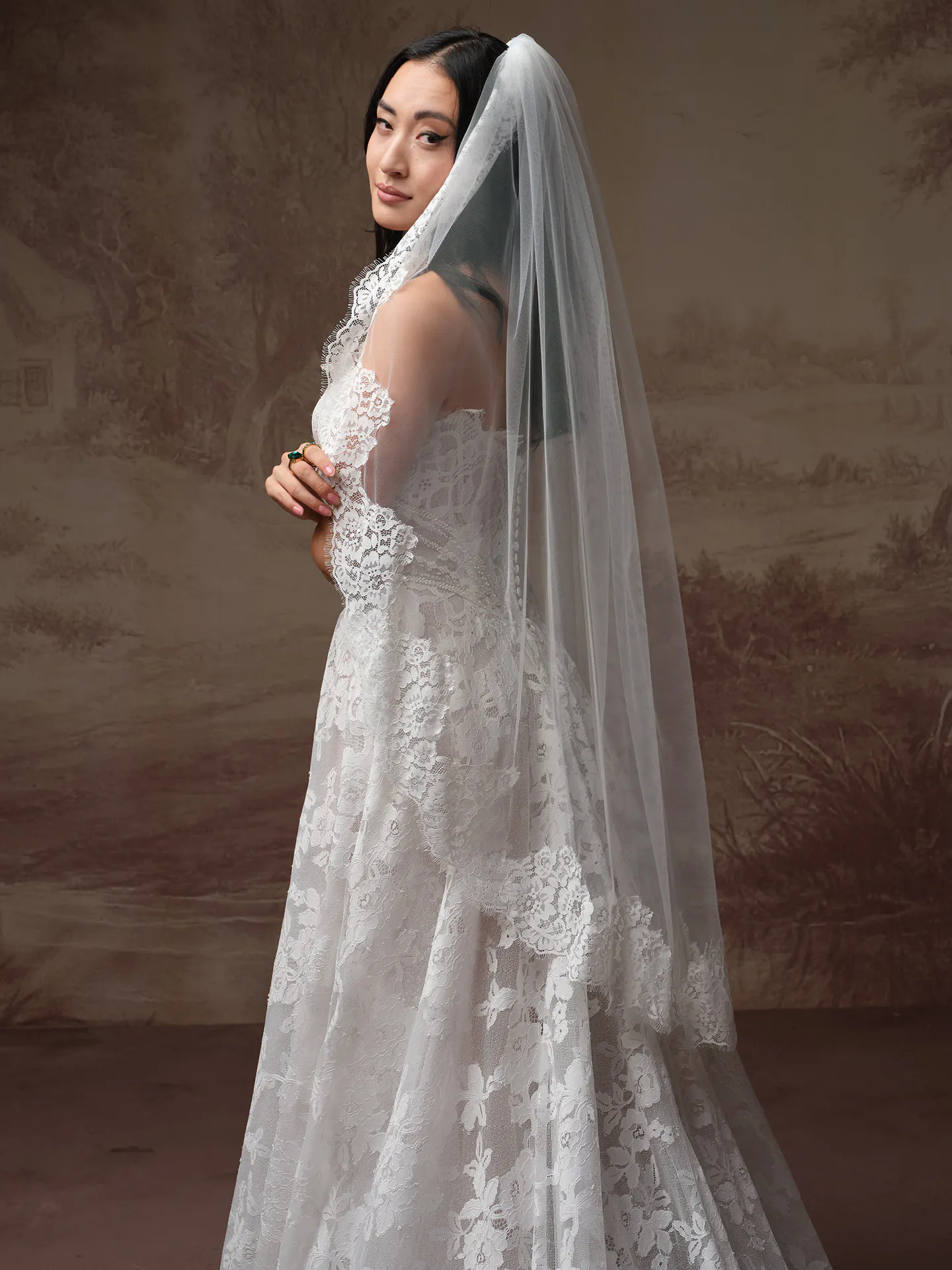 Mischa lace tulle A-line wedding dress by Maggie Sottero side view.