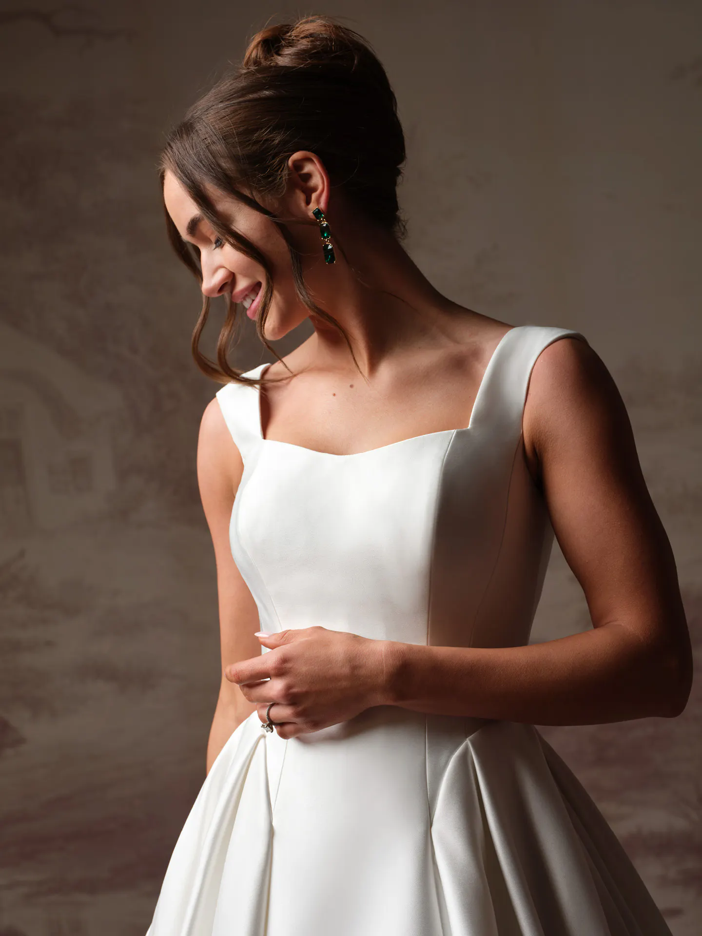 Maggie Sottero Pierce satin wedding dress front view.
