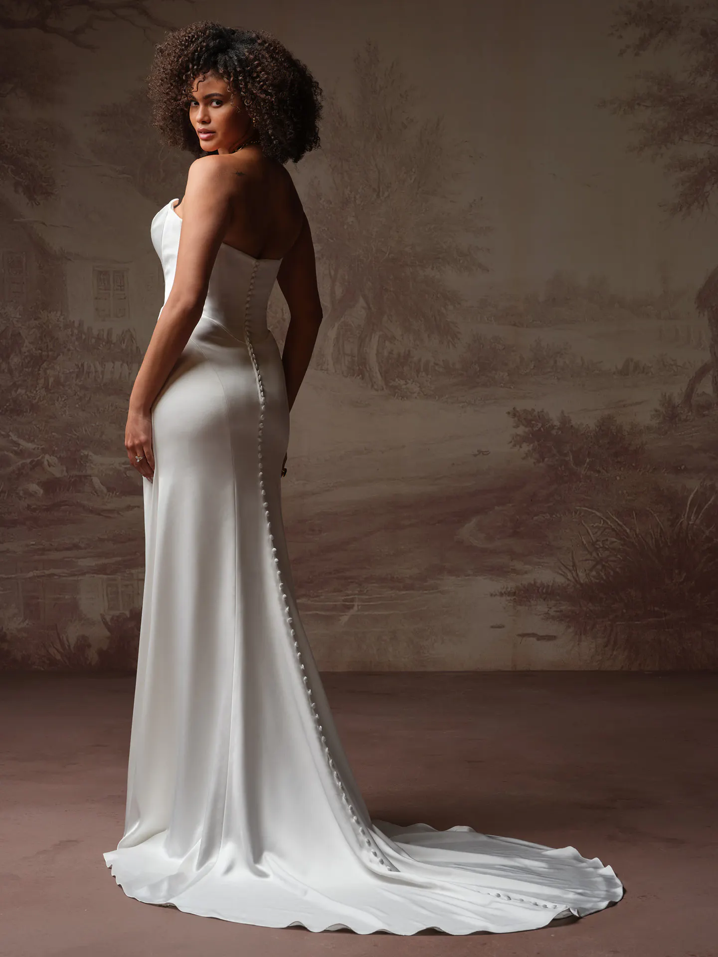 Maggie Sottero Prestyn sheath wedding dress back view with draped bodice.