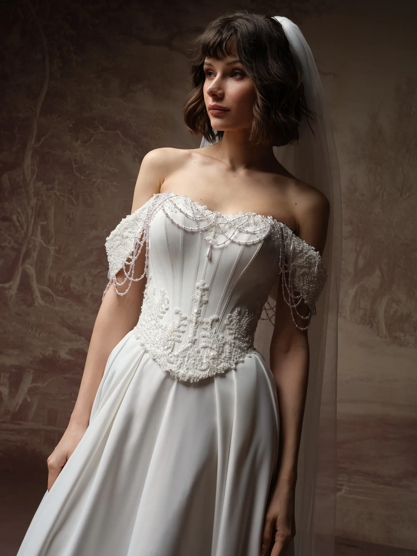 Maggie Sottero Seattle A Line wedding dress with pearl detail front view.
