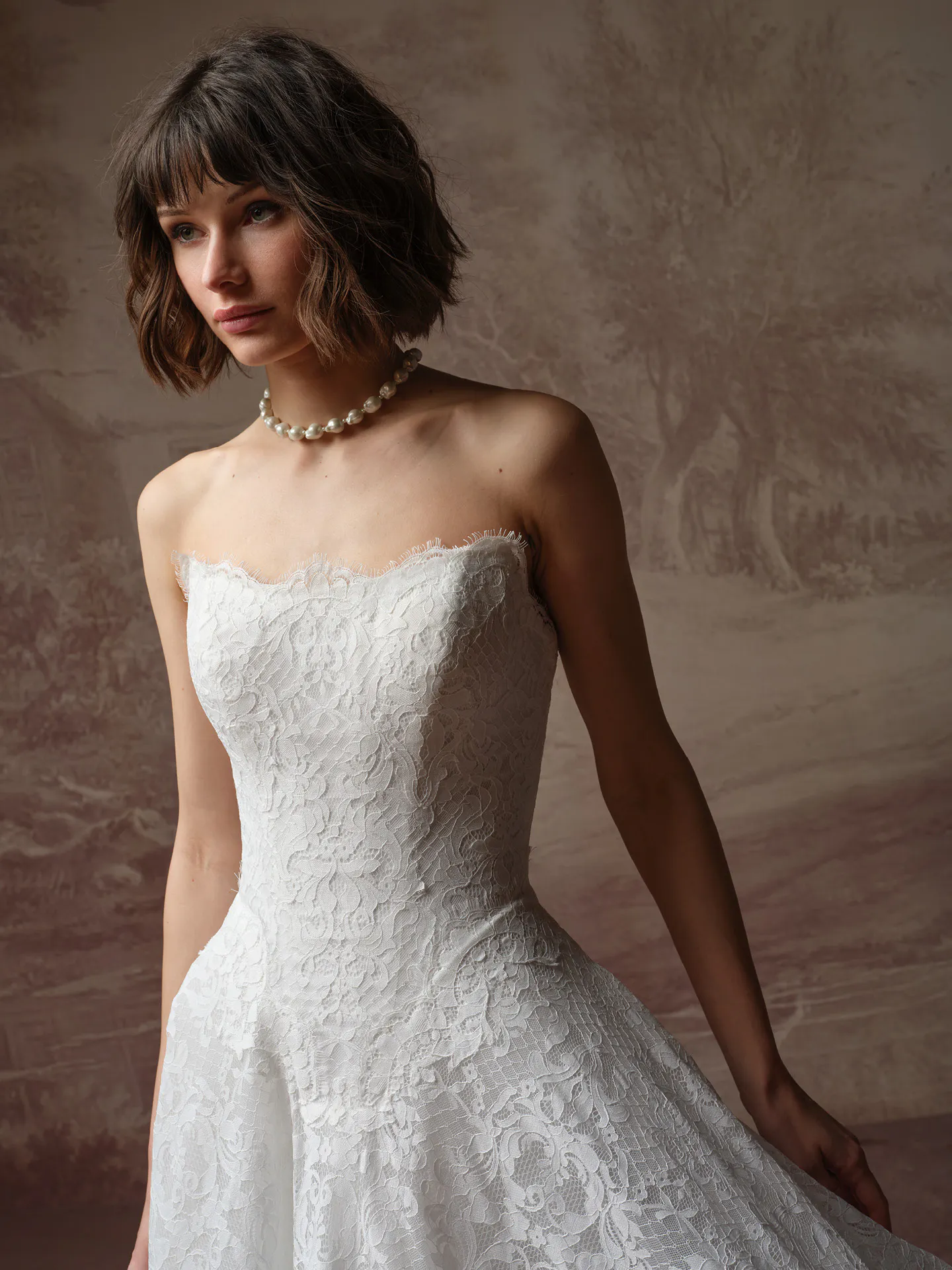 Maggie Sottero Serena front view of lace ballgown wedding dress.
