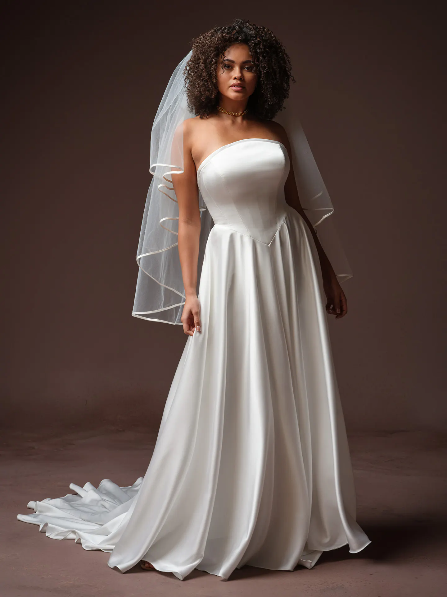 Maggie Sottero Tiffany front view, strapless A-line wedding dress with veil.