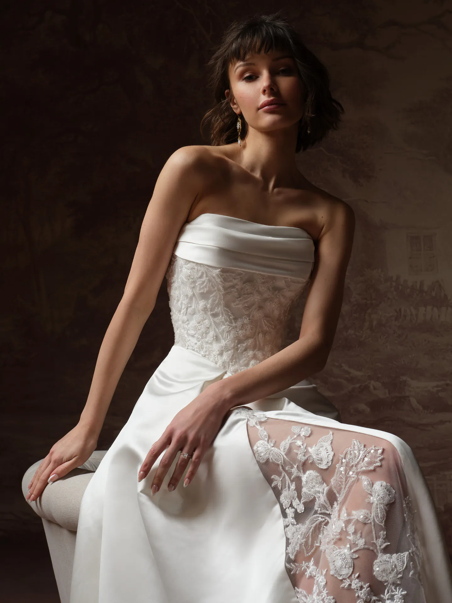 Maggie Sottero Wisteria dress side view, lace bodice and basque waist.