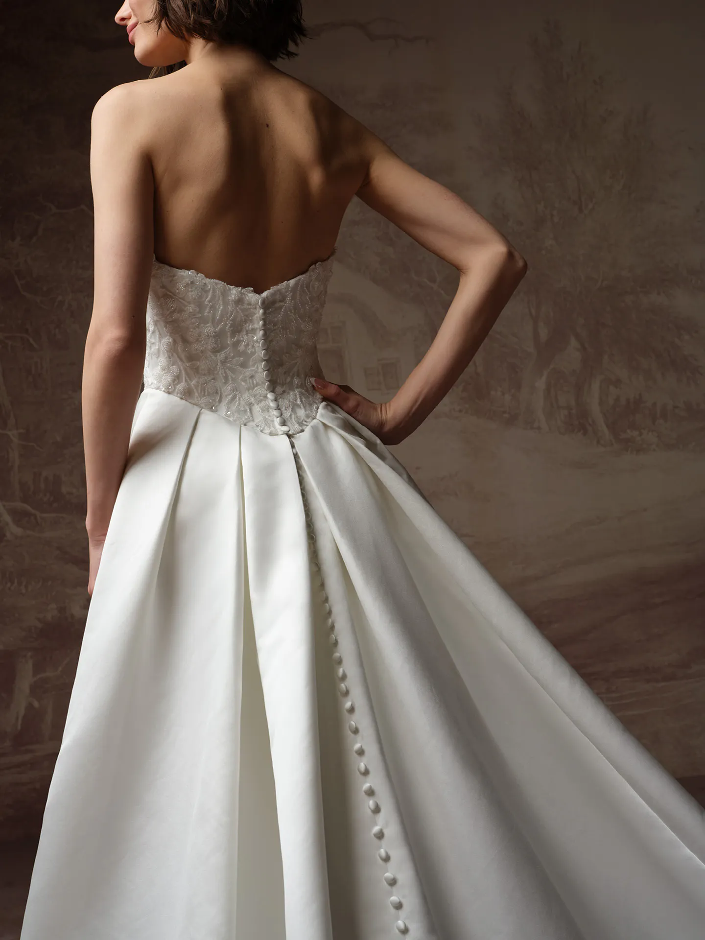 Maggie Sottero Wisteria back view lace bodice wedding dress.