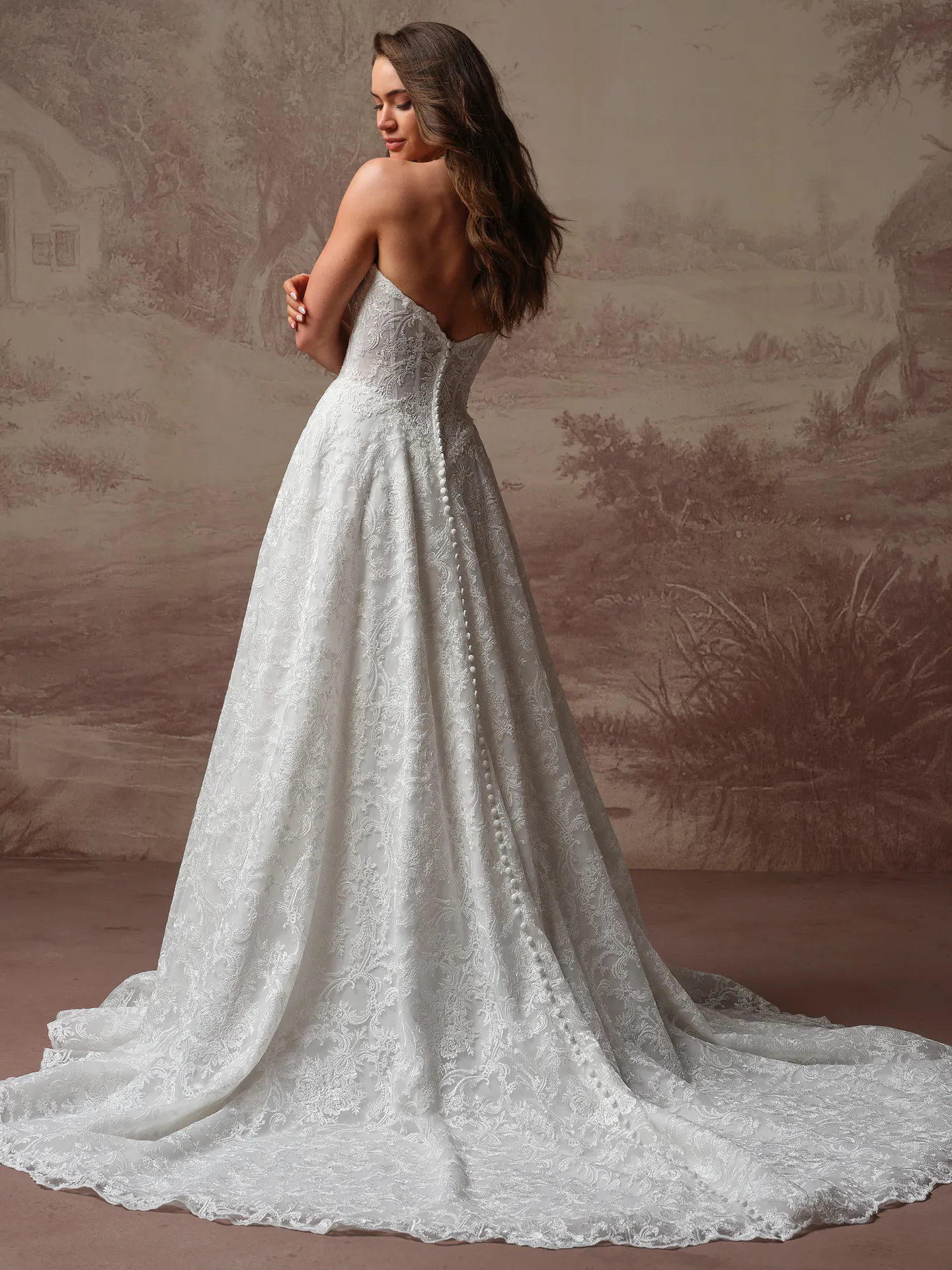 Maggie Sottero Zahia back view lace basque waist wedding dress.