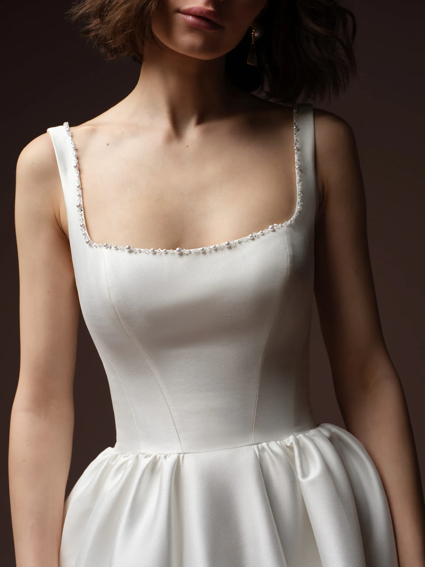 Zurielle front view crystal pearl neckline ballgown dress by Maggie Sottero.