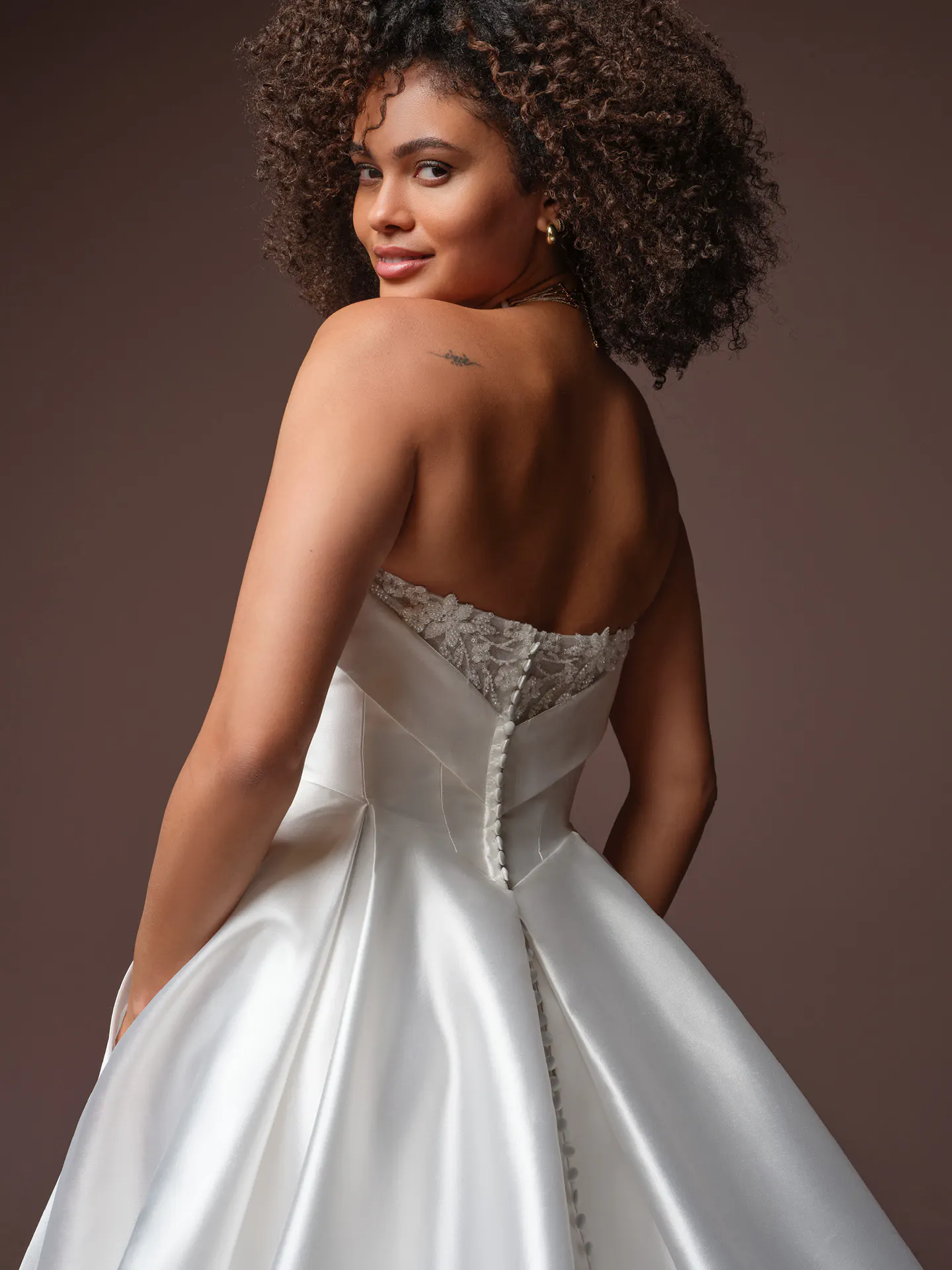 Rebecca Ingram Agatha strapless, back view with lace detailing.