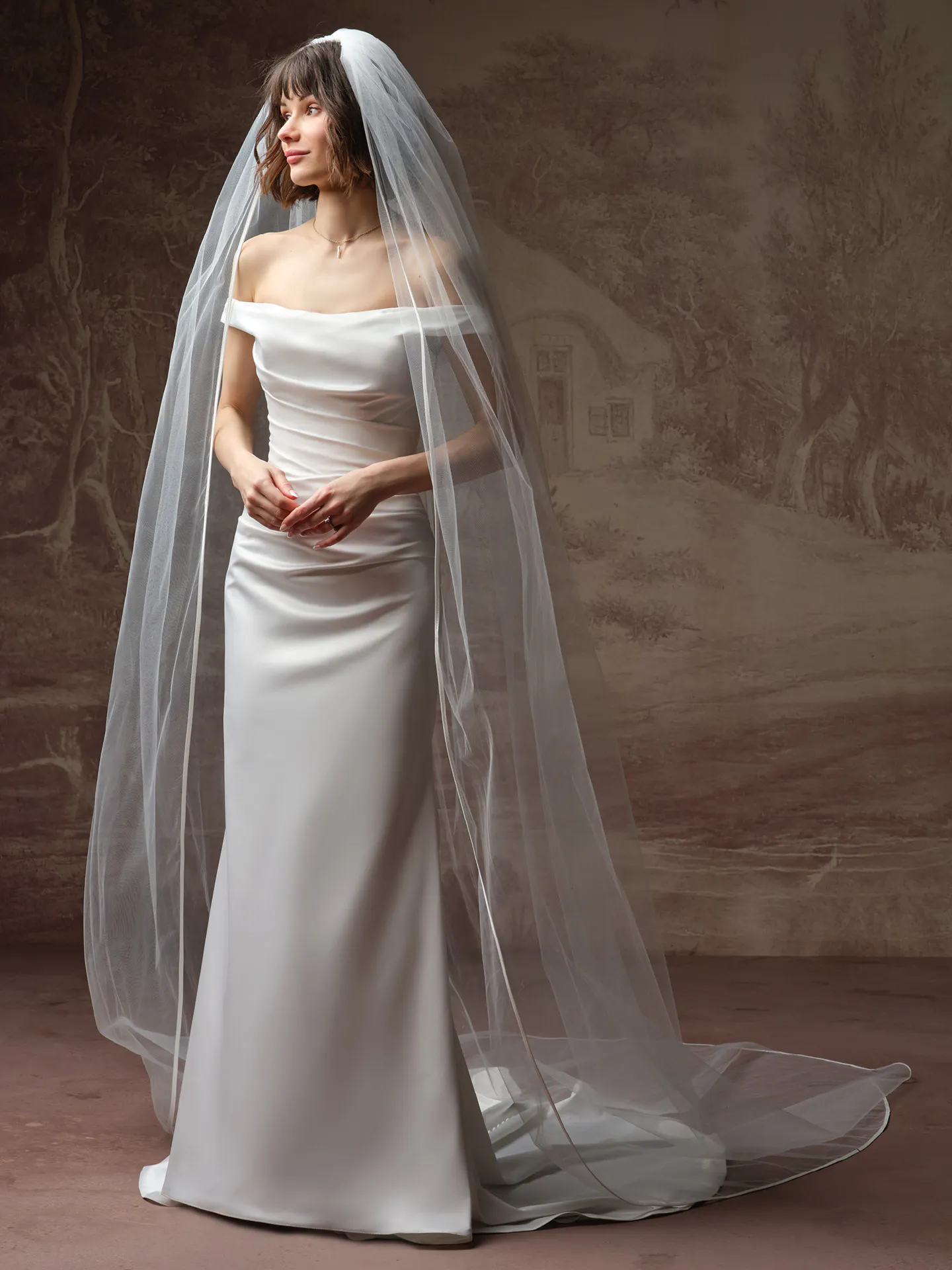 Rebecca Ingram Clementine off-shoulder sheath wedding dress, front view.