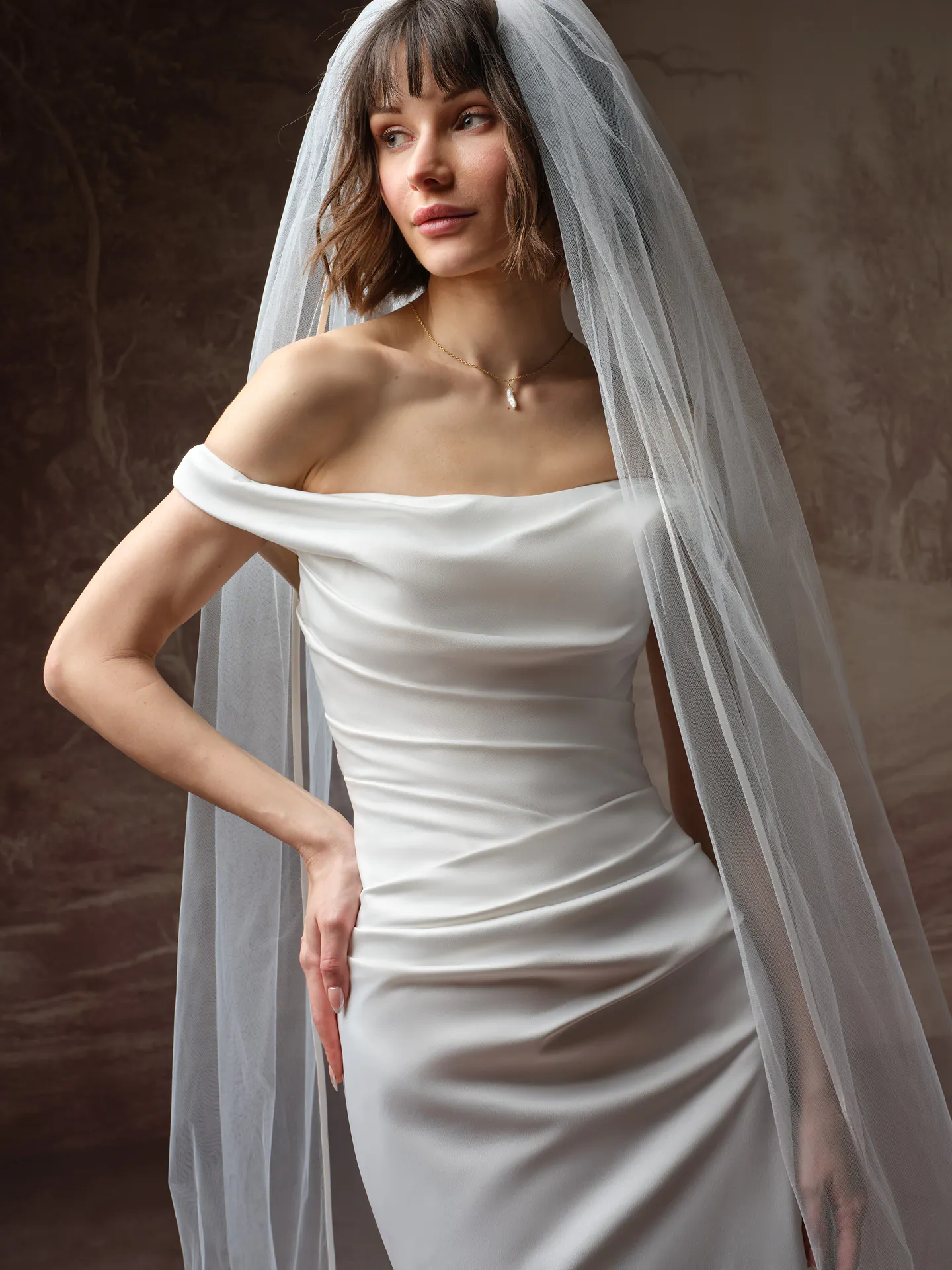 Rebecca Ingram Clementine, front view off-the-shoulder wedding dress with veil.