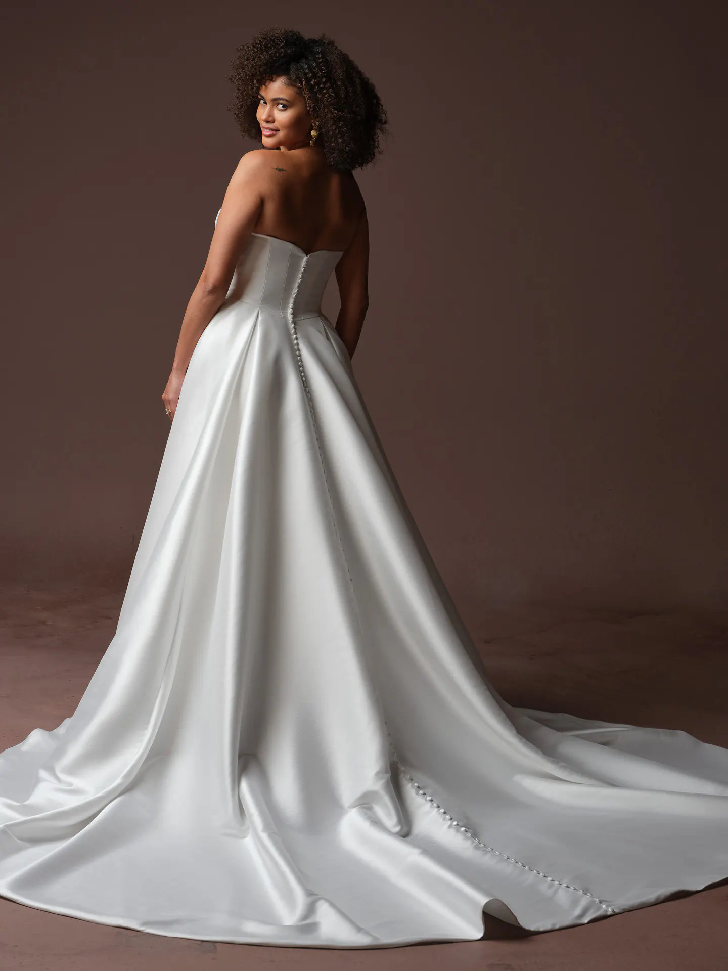 Rebecca Ingram Daphne, back view A-Line wedding dress with draped bodice.