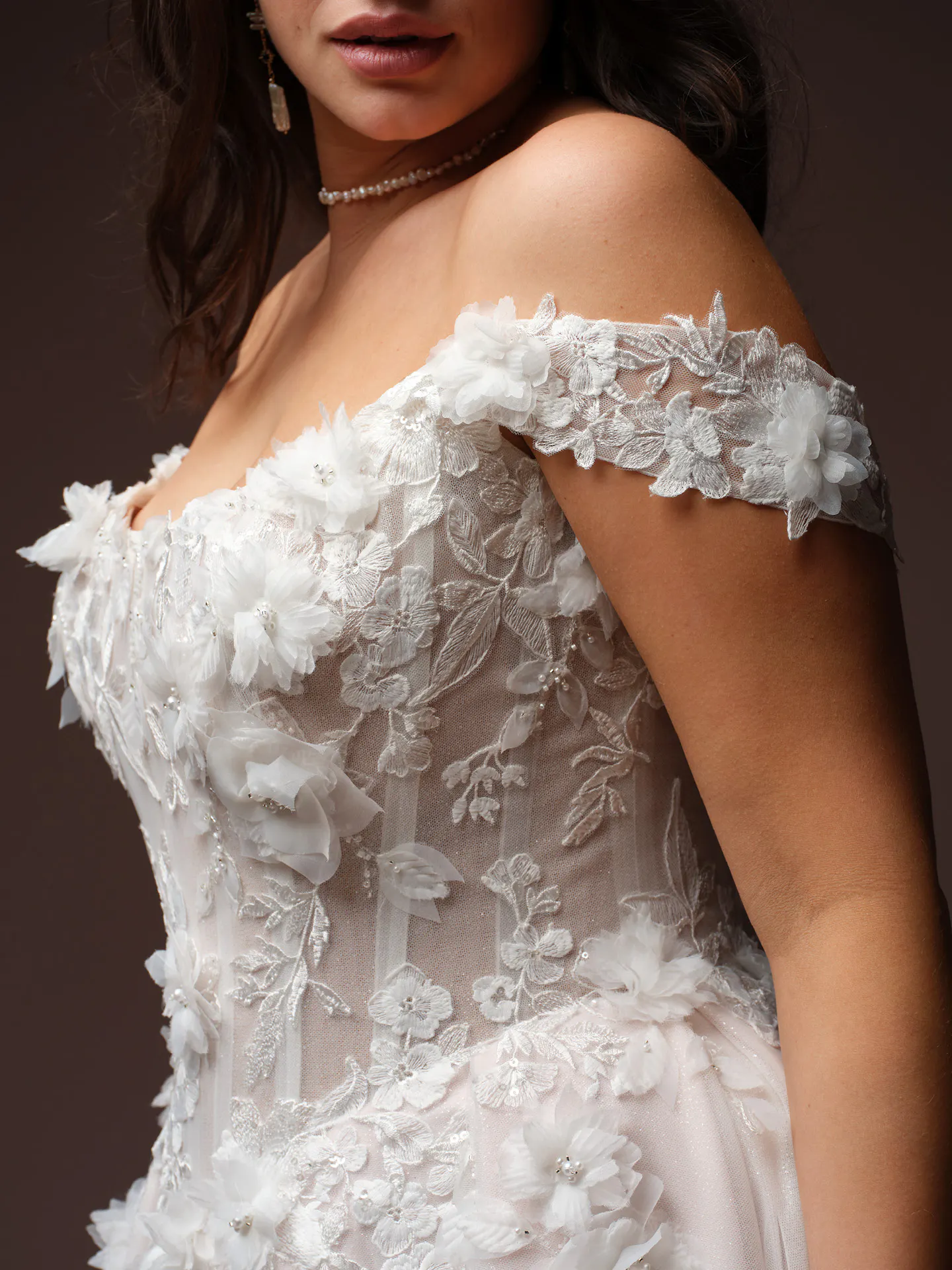 Rebecca Ingram Fleur, side view, 3-D floral lace off-shoulder wedding dress.