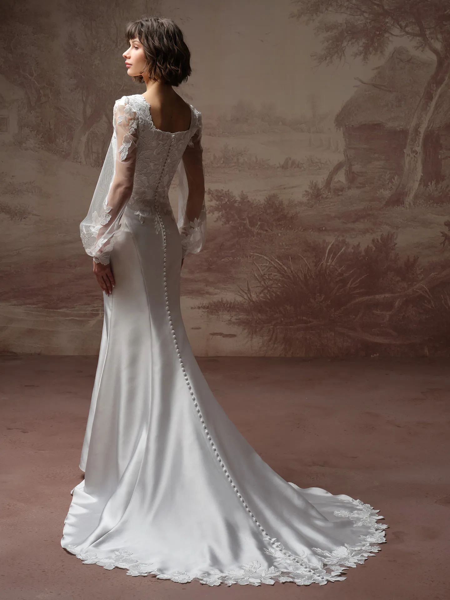 Rebecca Ingram Goldie Leigh, back view long sleeve wedding dress with lace details.