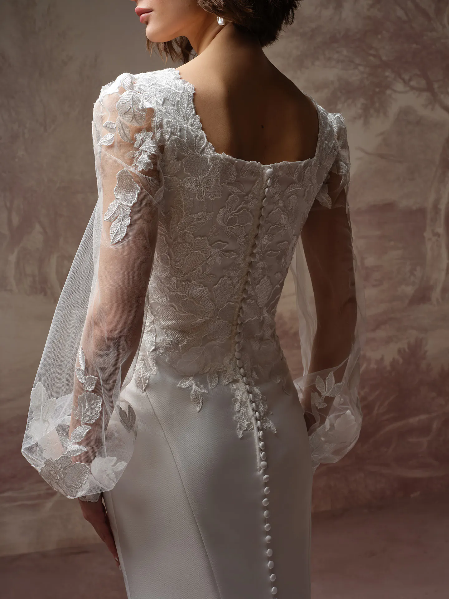 Rebecca Ingram Goldie Leigh, back view lace long sleeve wedding dress.