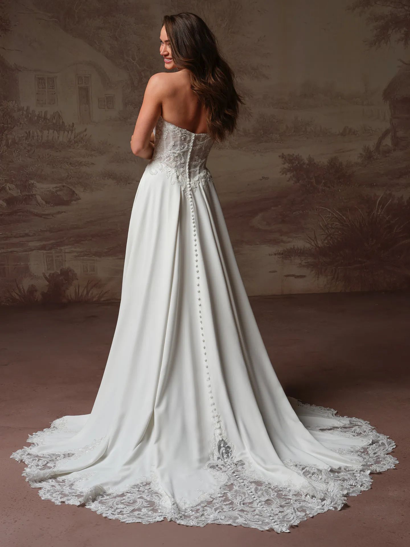 Rebecca Ingram Hazel, back view lace bodice A-line wedding dress with train.