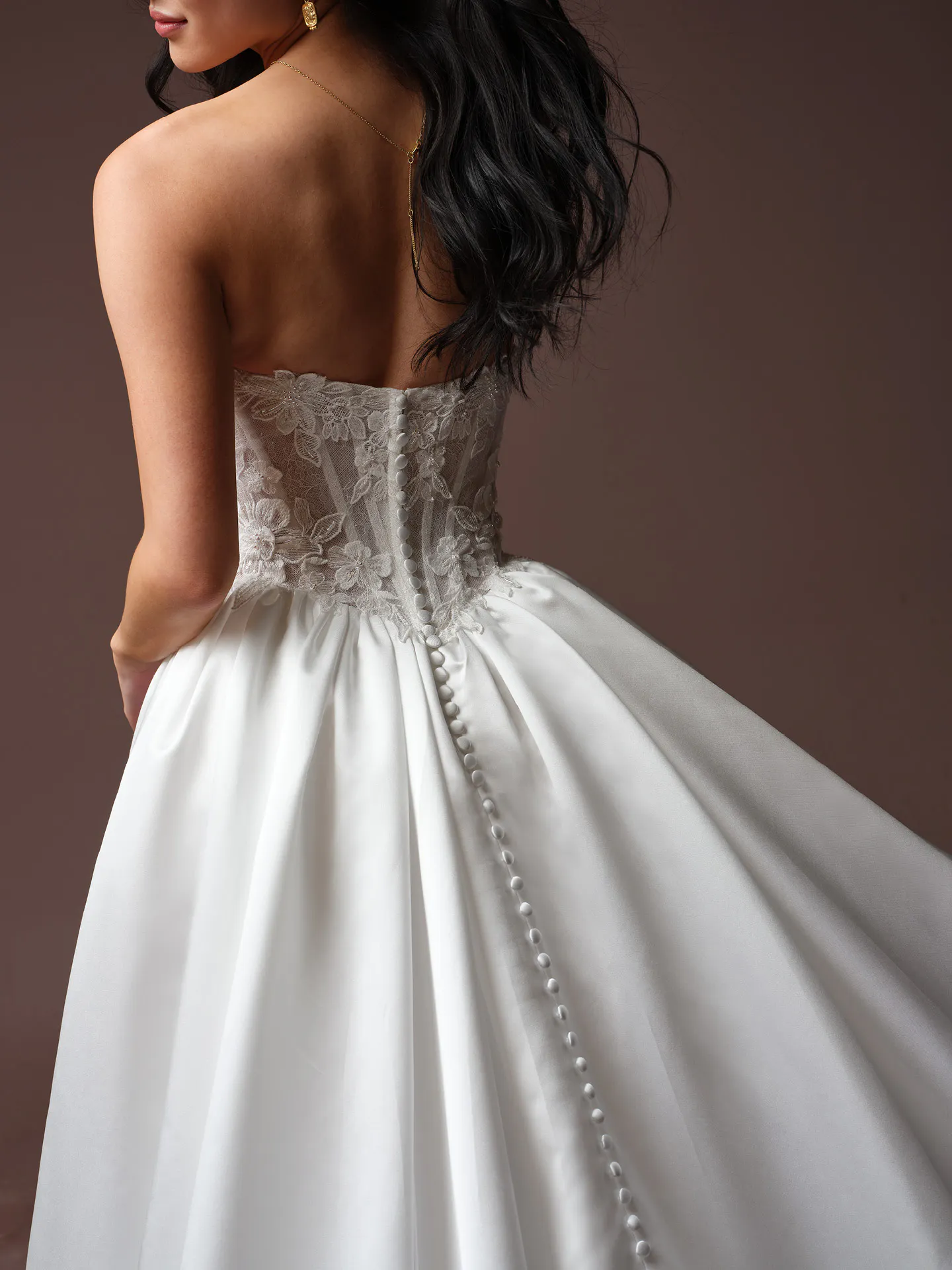Rebecca Ingram Laurette, back view, lace bodice ballgown with button detail.
