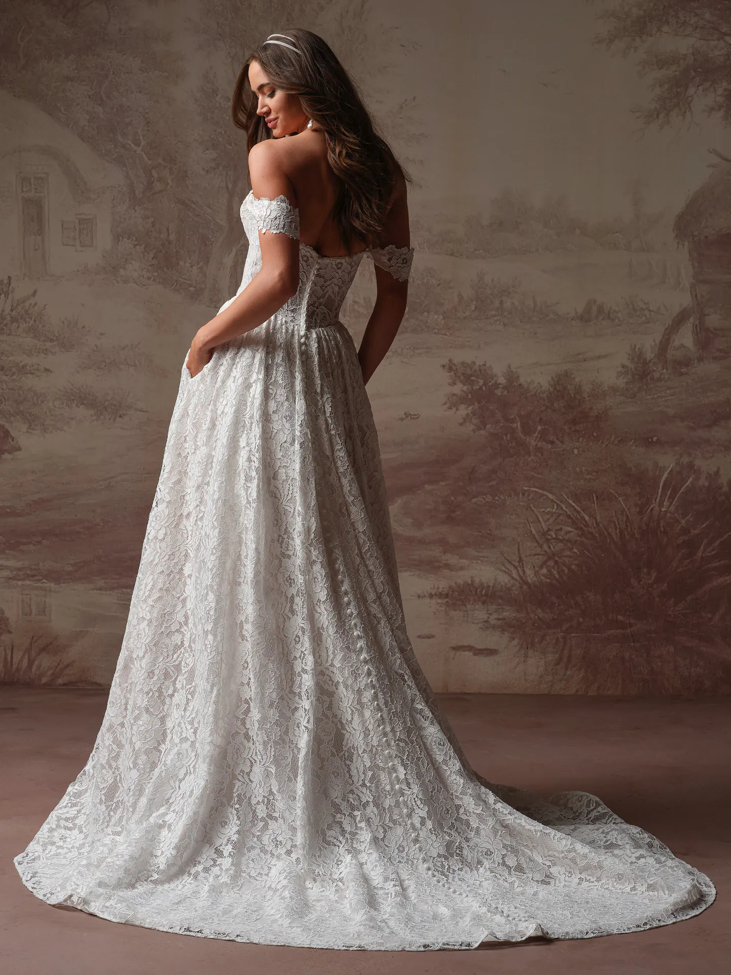 Rebecca Ingram Narelle, back view lace wedding dress with off-shoulder sleeves.