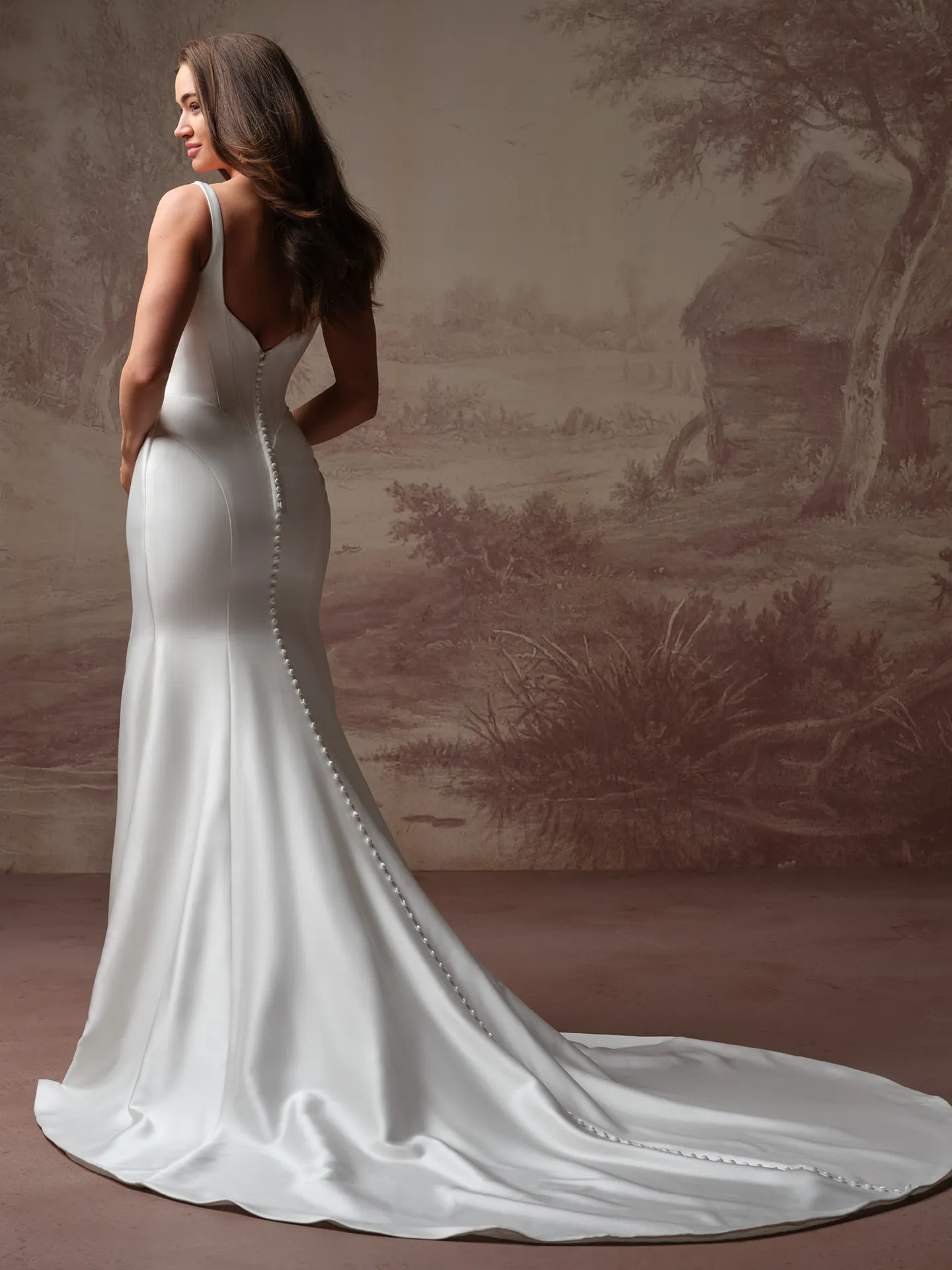 Rebecca Ingram Pamela, back view satin wedding dress with buttons and train.