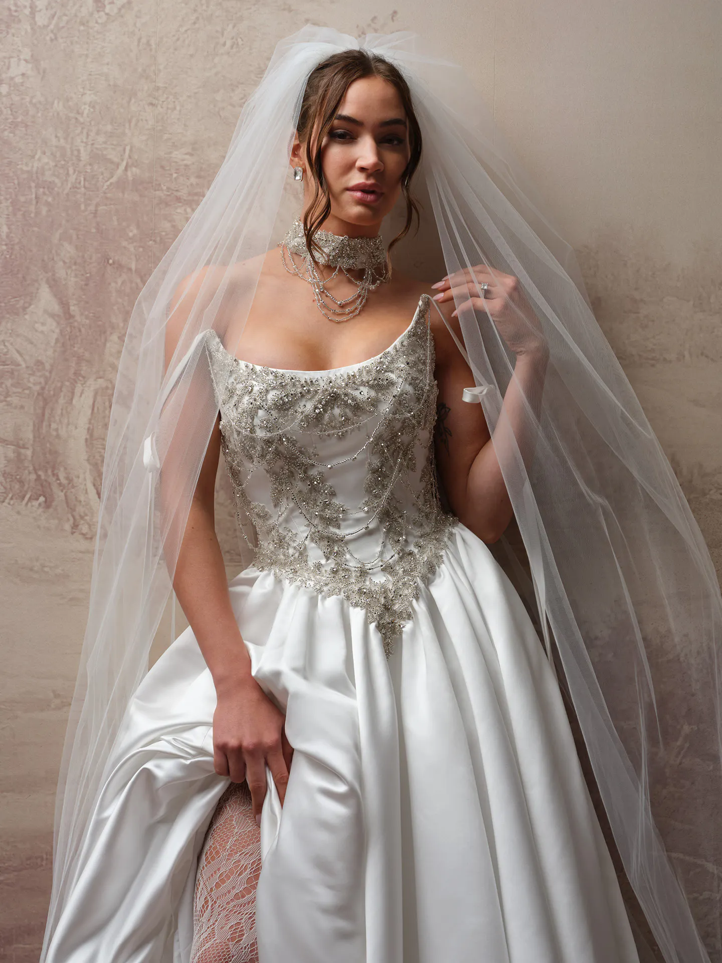Sottero and Midgley Aelarion front view, beaded bodice satin wedding dress with veil.