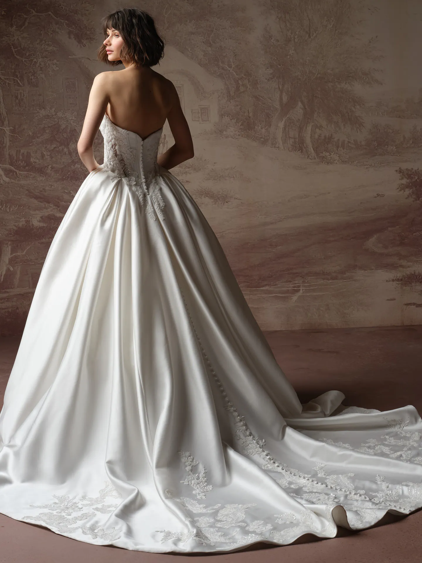 Sottero and Midgley Burke Lane back view beaded lace ballgown wedding dress.